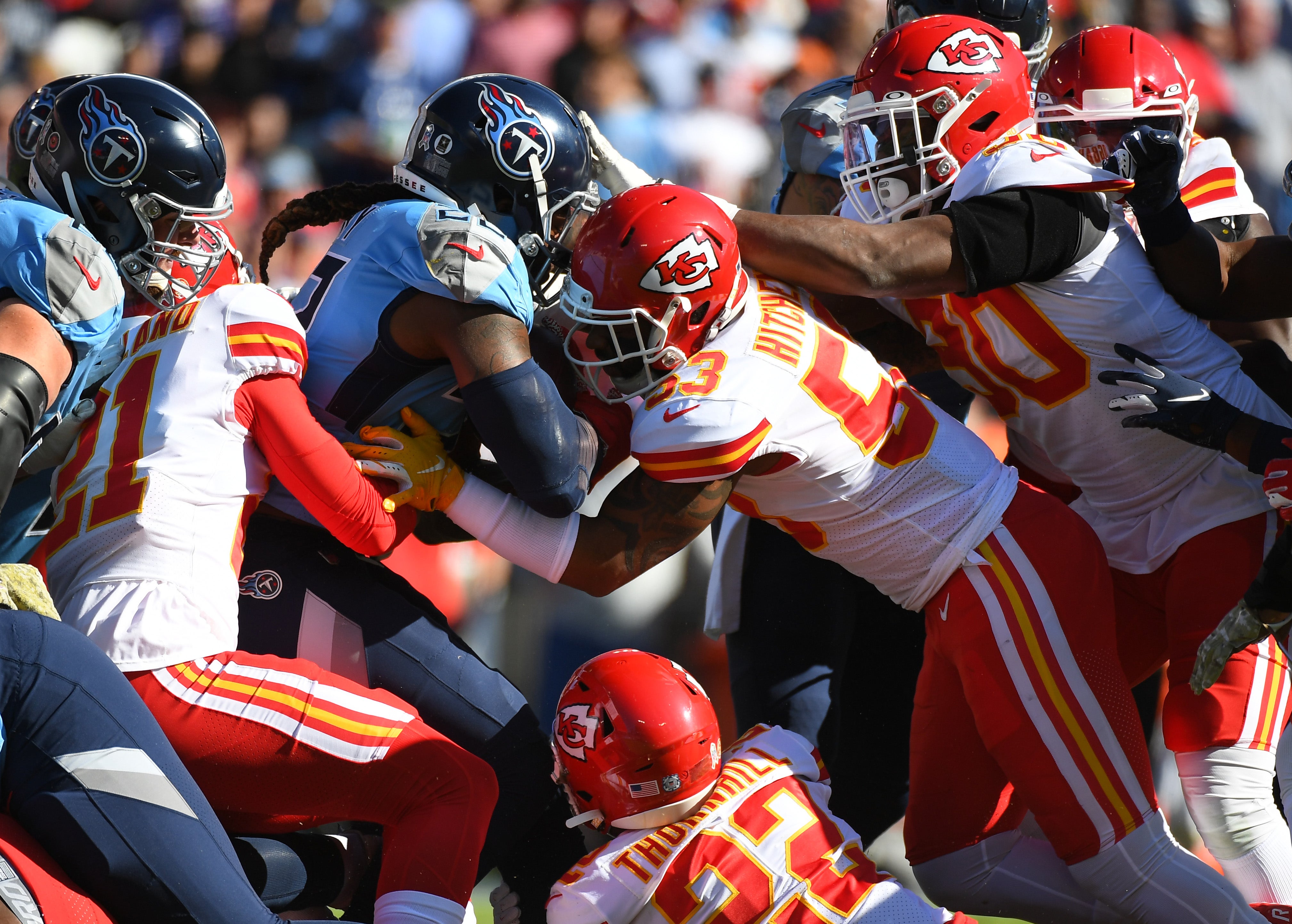 Nov 10, 2019; Nashville, TN, USA; Tennessee Titans running back Derrick Henry (22) is stopped after a short gain during the first half against the Kansas City Chiefs at Nissan Stadium.