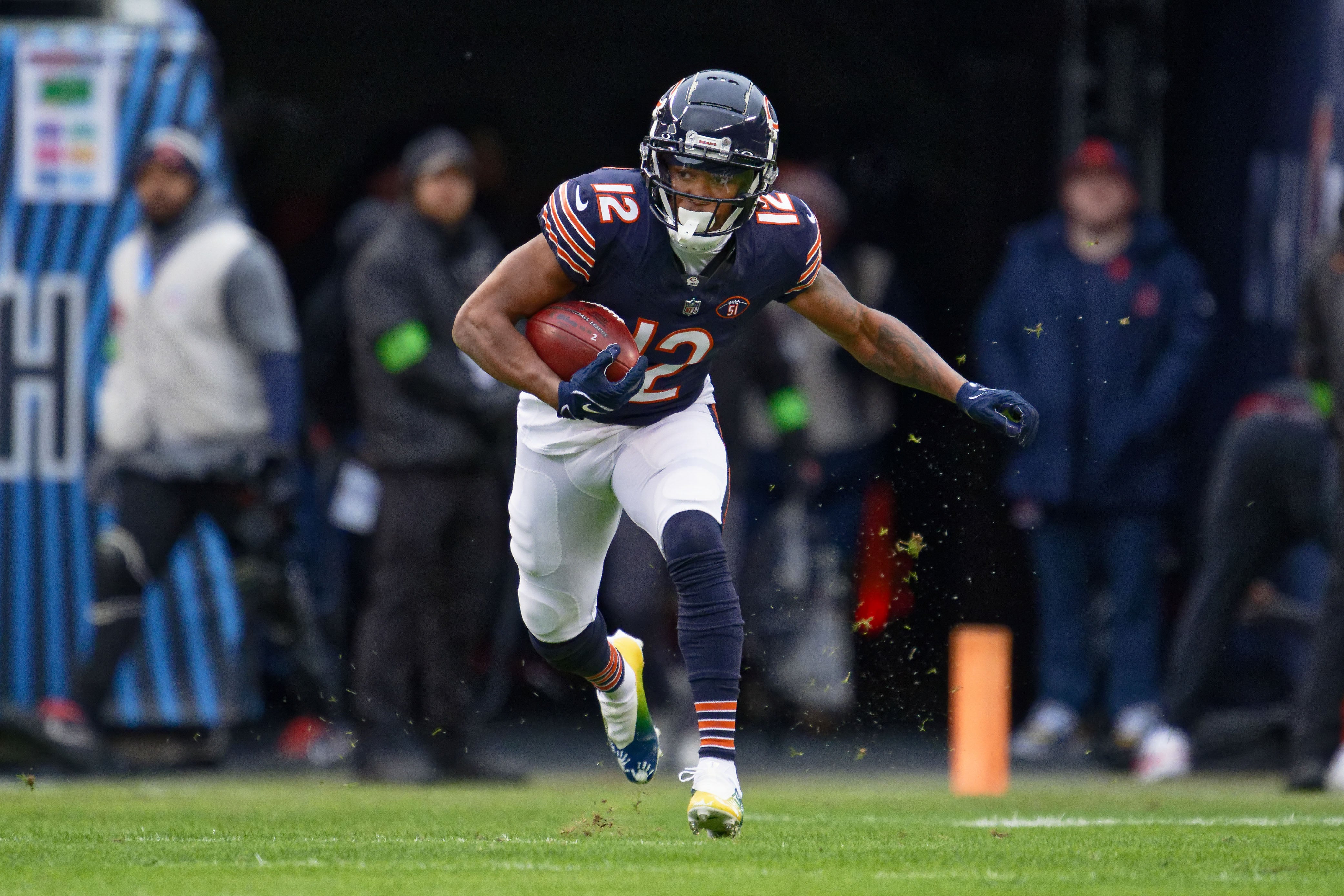 Dec 10, 2023; Chicago, Illinois, USA; Chicago Bears wide receiver Velus Jones Jr. II (12) runs with the ball against the Detroit Lions at Soldier Field.