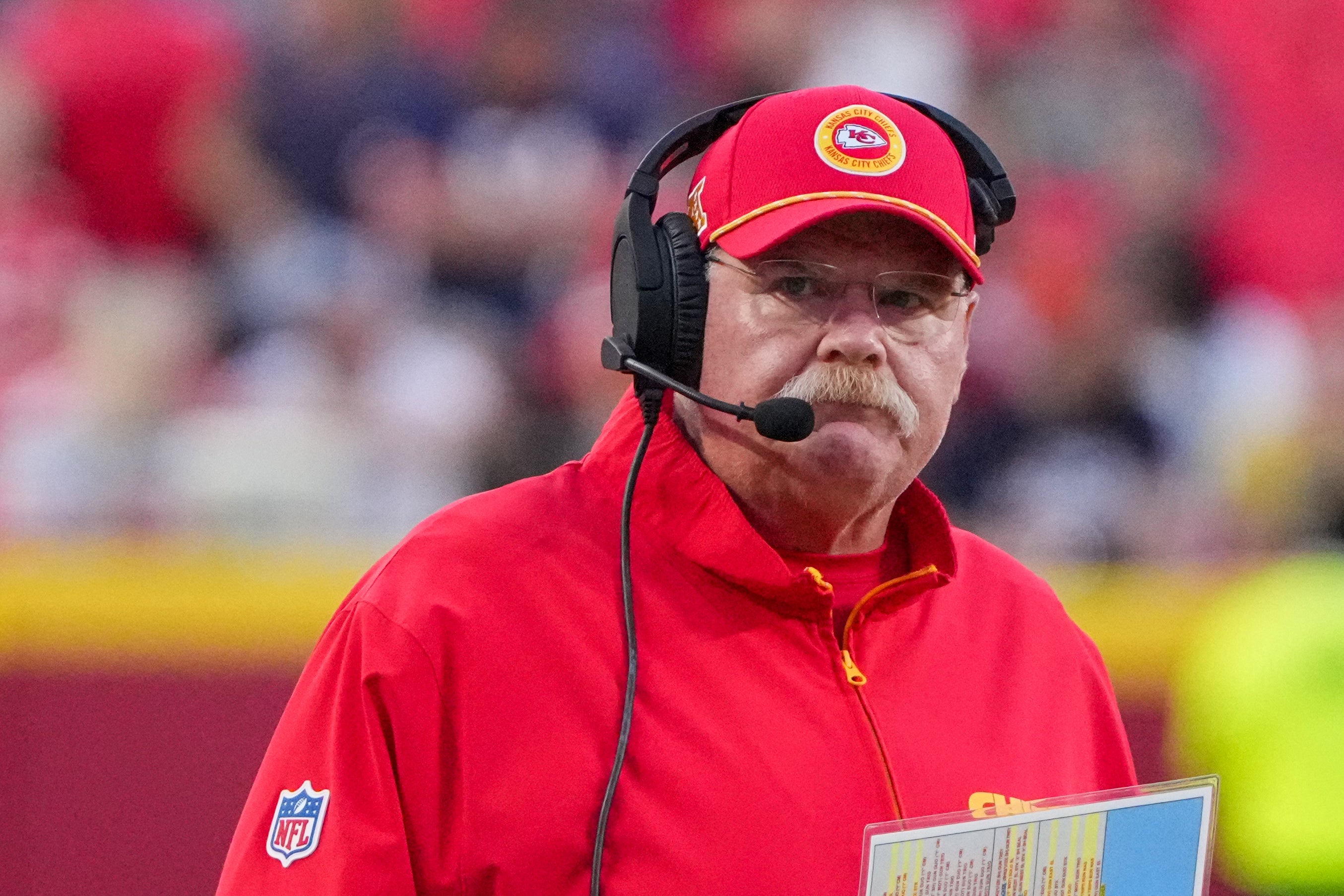 Aug 22, 2024; Kansas City, Missouri, USA; Kansas City Chiefs head coach Andy Reid watches play against the Chicago Bears during the first half at GEHA Field at Arrowhead Stadium.