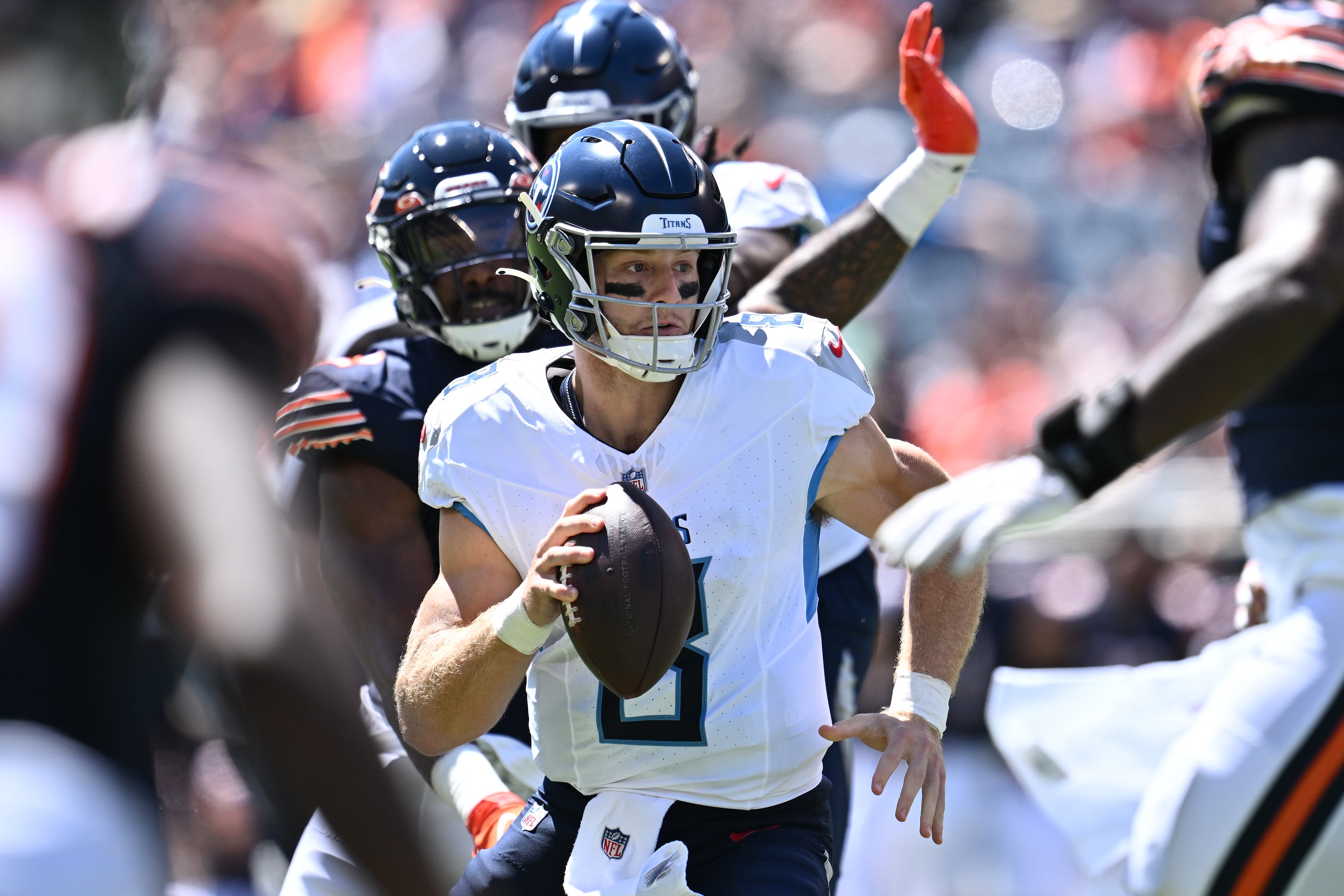 Tennessee Titans quarterback Will Levis (8) looks downfield in the first half against the Chicago Bears at Soldier Field. Jamie Sabau-Imagn Images