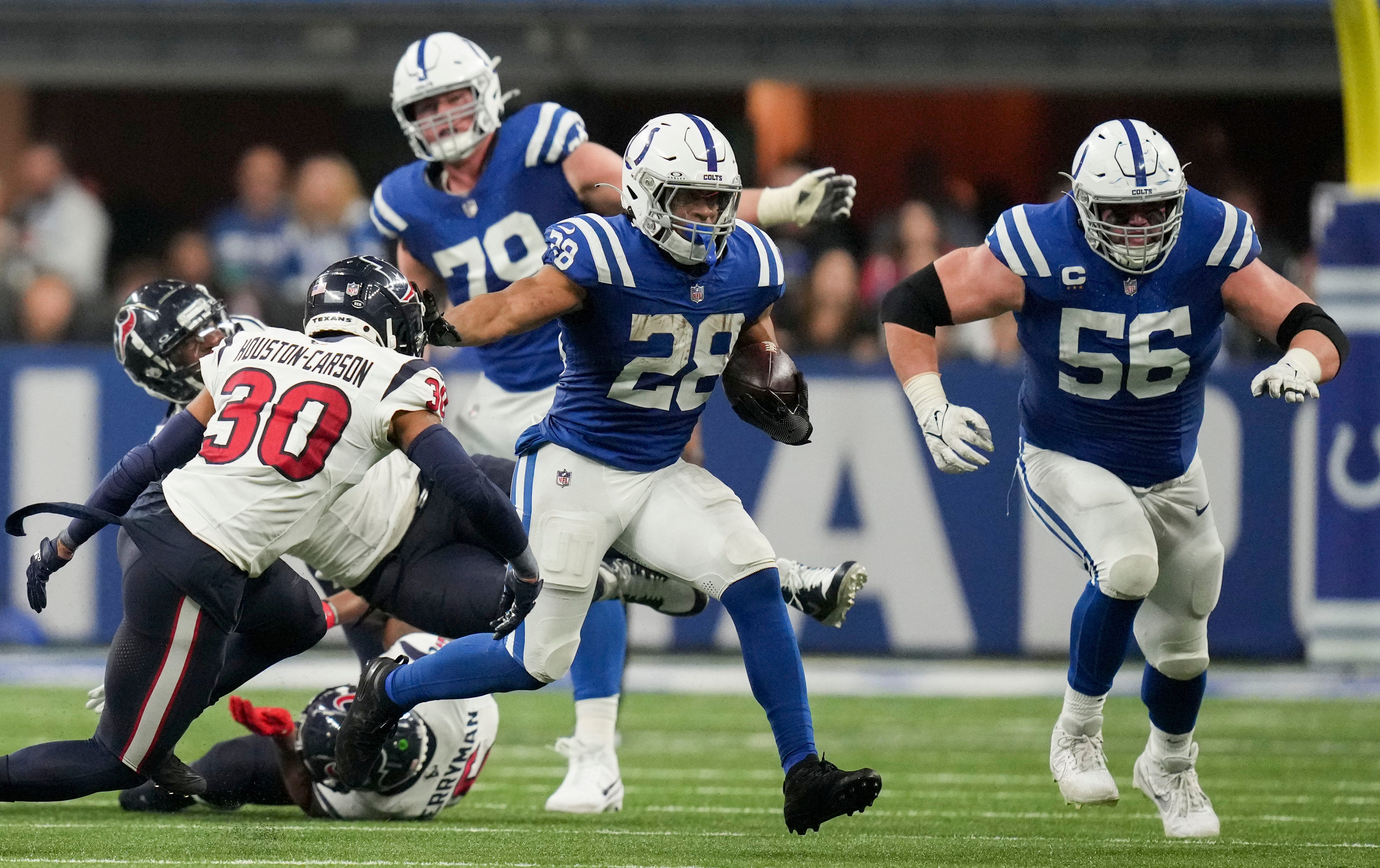 Indianapolis Colts running back Jonathan Taylor (28) rushes the ball Saturday, Jan. 6, 2024, during a game against the Houston Texans at Lucas Oil Stadium in Indianapolis.