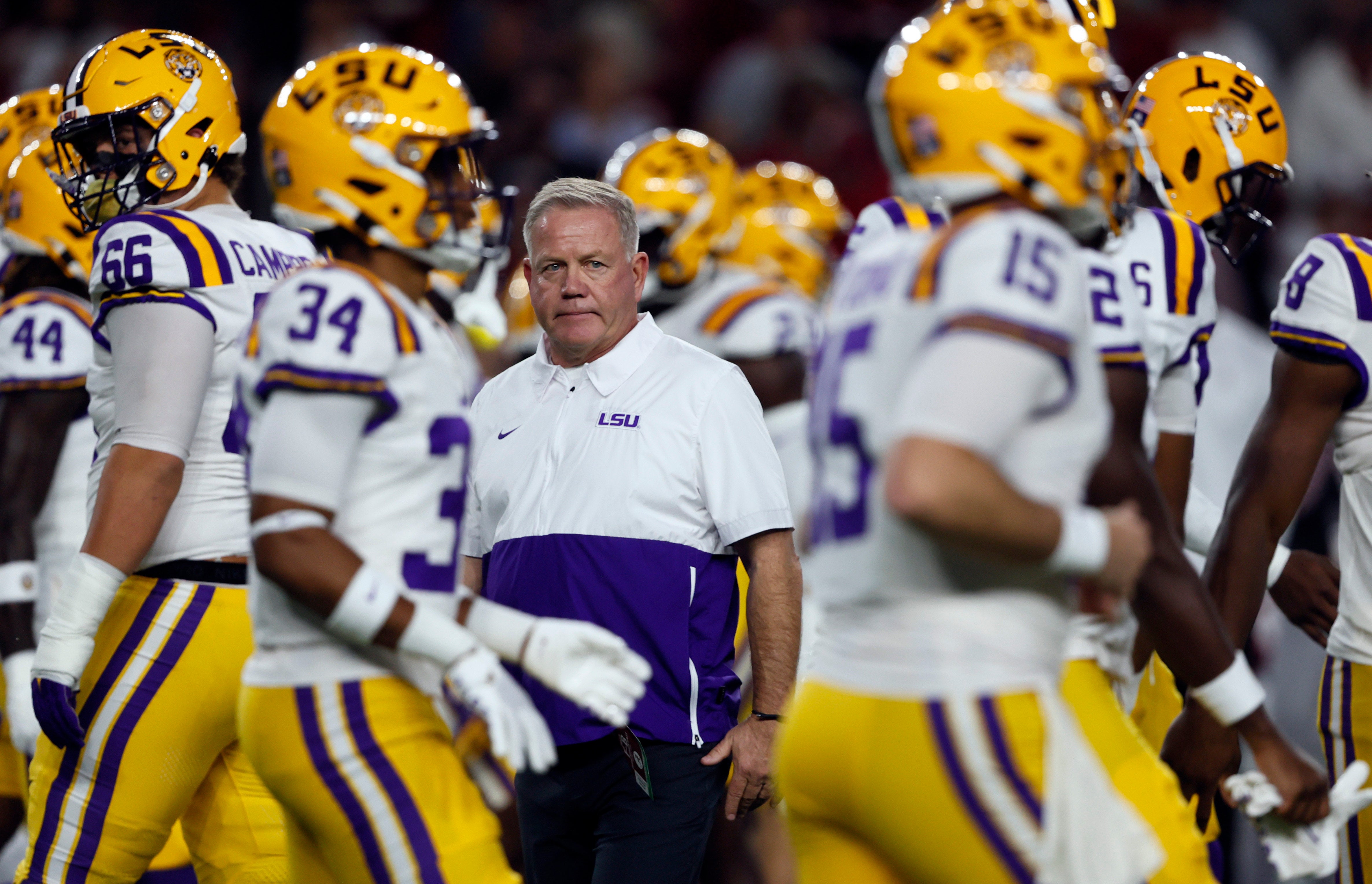 Brian Kelly stands amidst his LSU Tigers