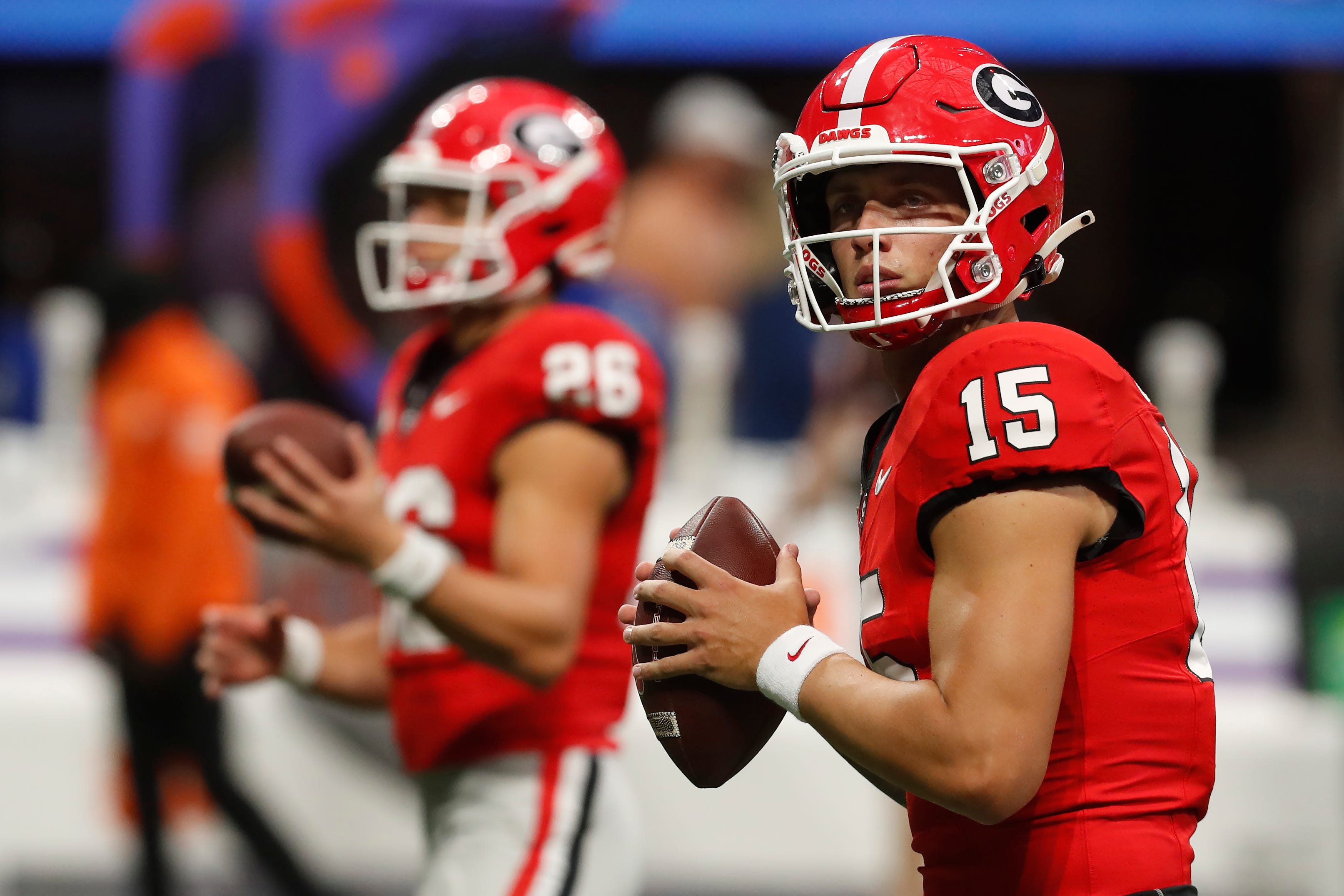 Georgia quarterback Carson Beck (15) warms up before the start of the NCAA Aflac Kickoff Game in Atlanta, on Saturday, Aug. 31, 2024.