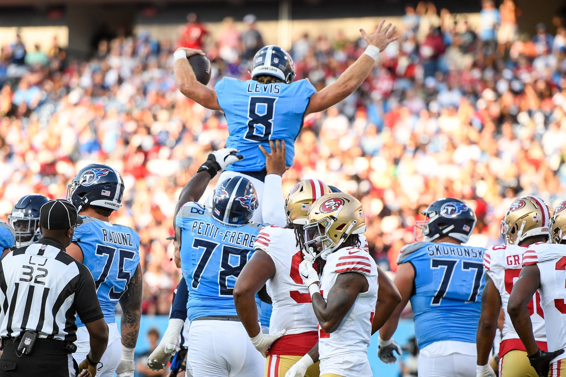 Aug 10, 2024; Nashville, Tennessee, USA; Tennessee Titans Will Levis (8) celebrates his touchdown against the San Francisco 49ers during the first half at Nissan Stadium. Mandatory Credit: Steve Roberts-Imagn Images