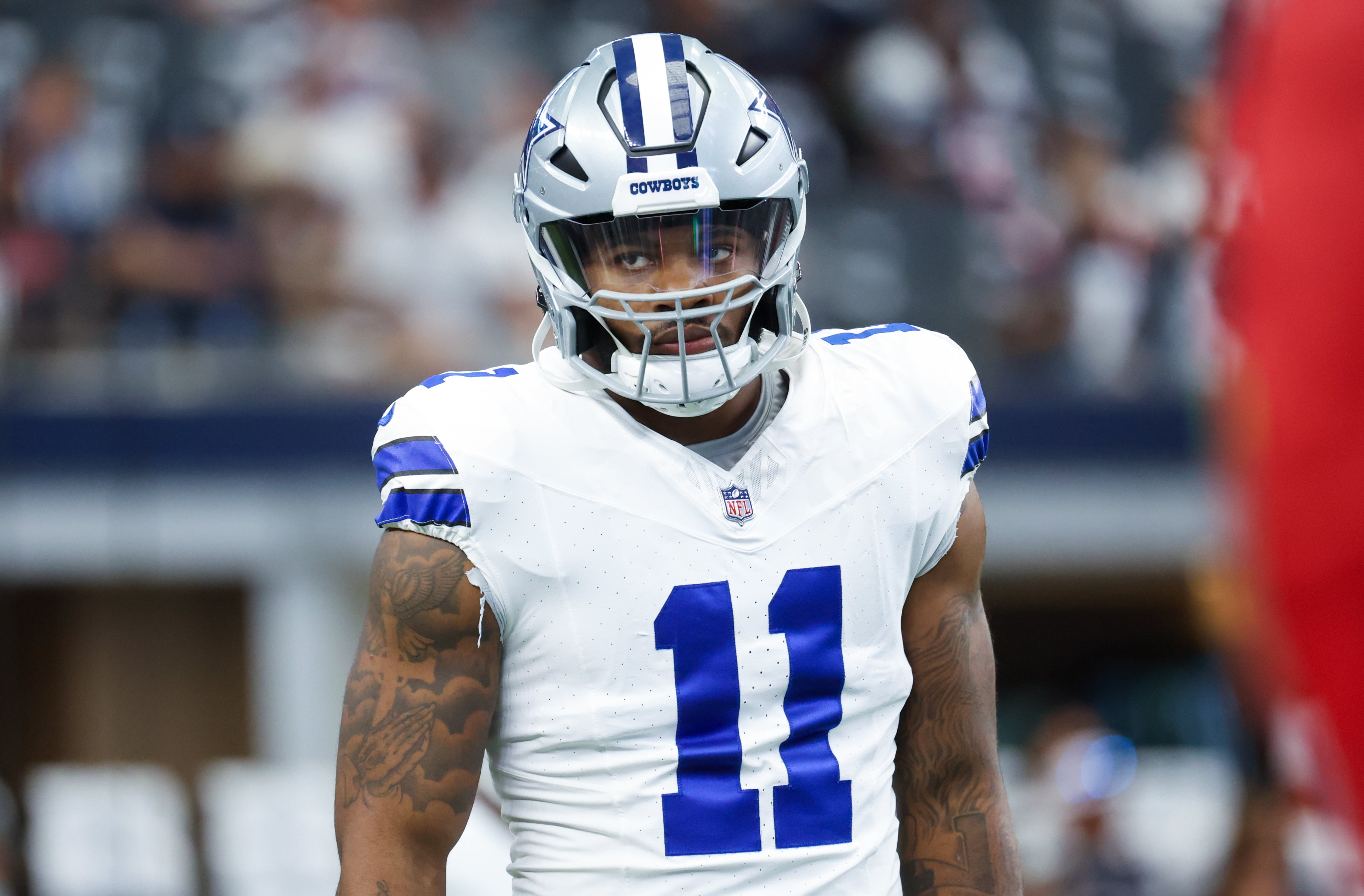 Dallas Cowboys linebacker Micah Parsons (11) warms up before the game against the New England Patriots at AT&T Stadium.