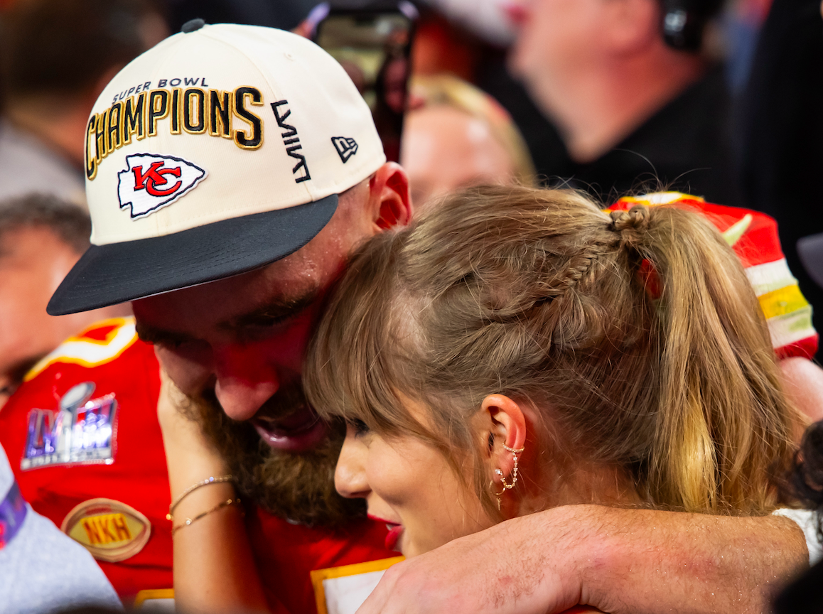 Feb 11, 2024; Paradise, Nevada, USA; Kansas City Chiefs tight end Travis Kelce (87) celebrates with girlfriend Taylor Swift after defeating the San Francisco 49ers in Super Bowl LVIII at Allegiant Stadium.