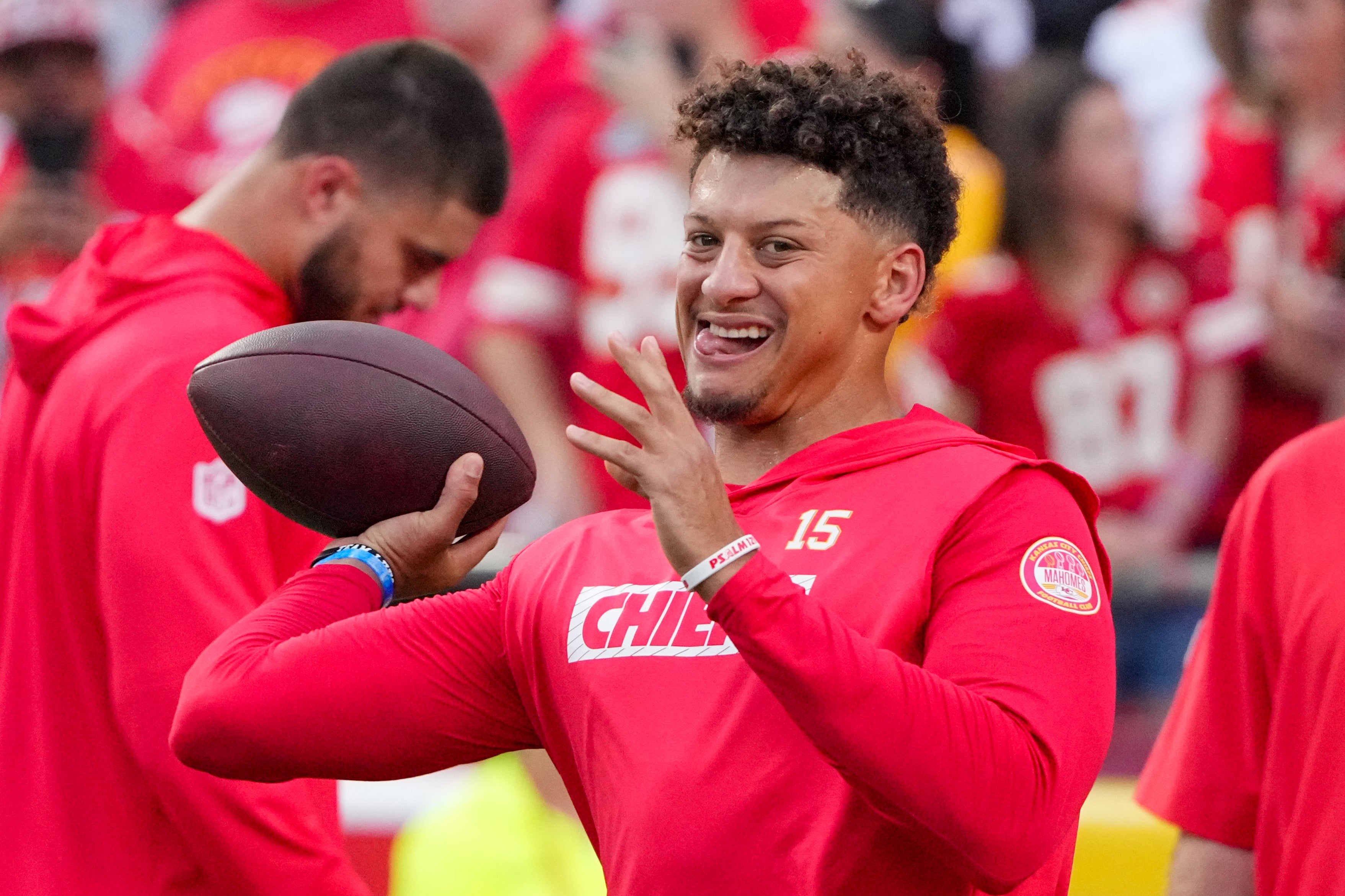 Sep 5, 2024; Kansas City, Missouri, USA; Kansas City Chiefs quarterback Patrick Mahomes (15) throws a pass against the Baltimore Ravens during warm ups at GEHA Field at Arrowhead