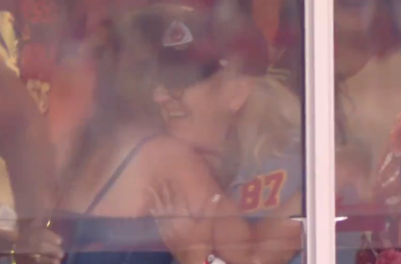 Taylor Swift and Donna Kelce hug after Travis Kelce makes an impressive catch i the Chiefs first game of the 2024 NFL season against the Baltimore Ravens.