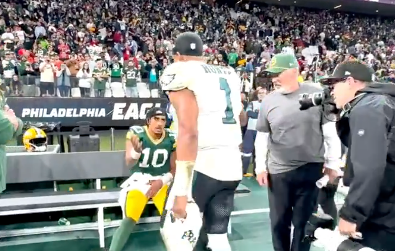 Philadelphia Eagles quarterback Jalen Hurts finds injured Green Bay Packers QB Jordan Love after win in Brazil.