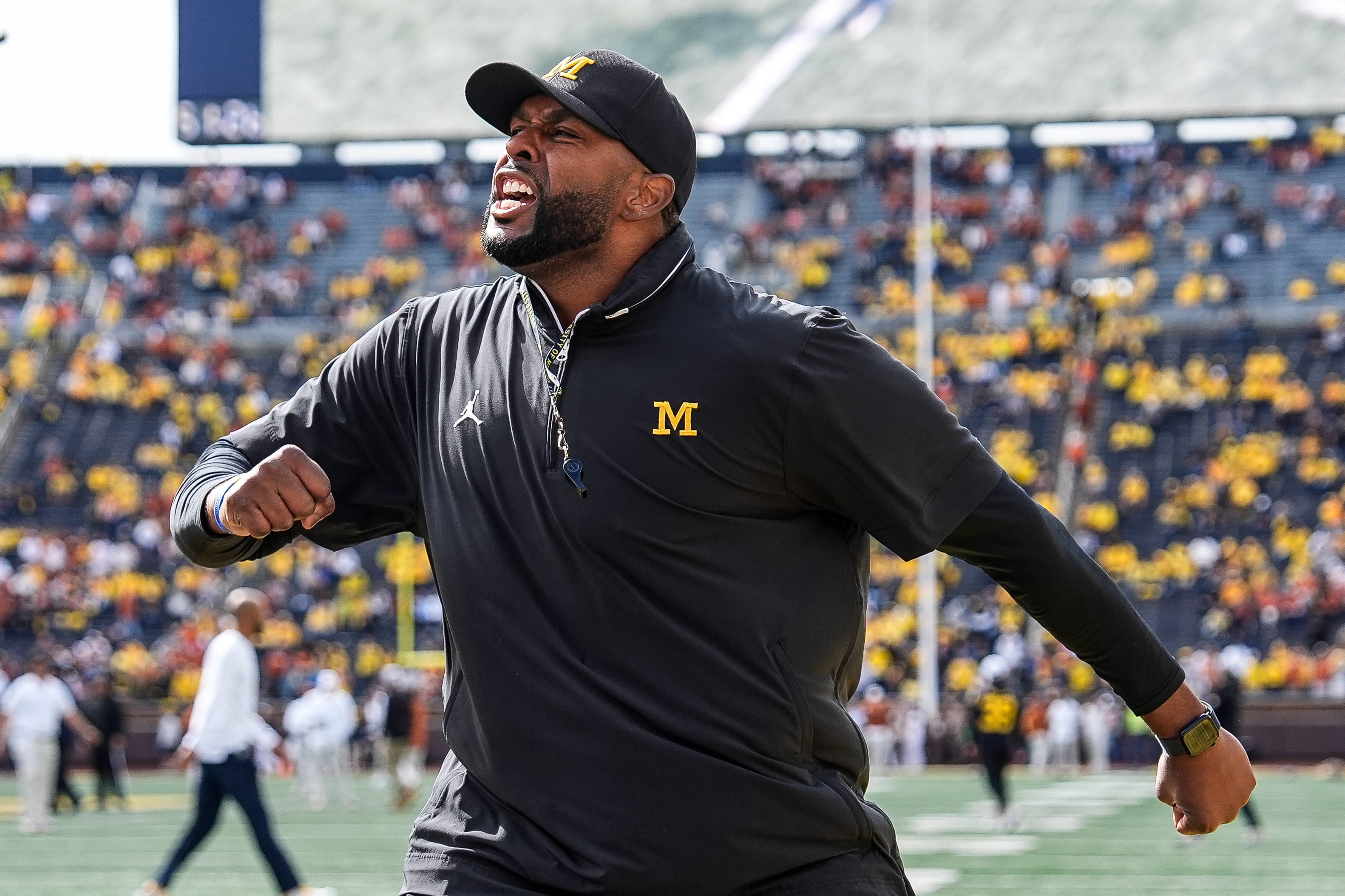Sherrone Moore angry on the Michigan sidelines against Texas