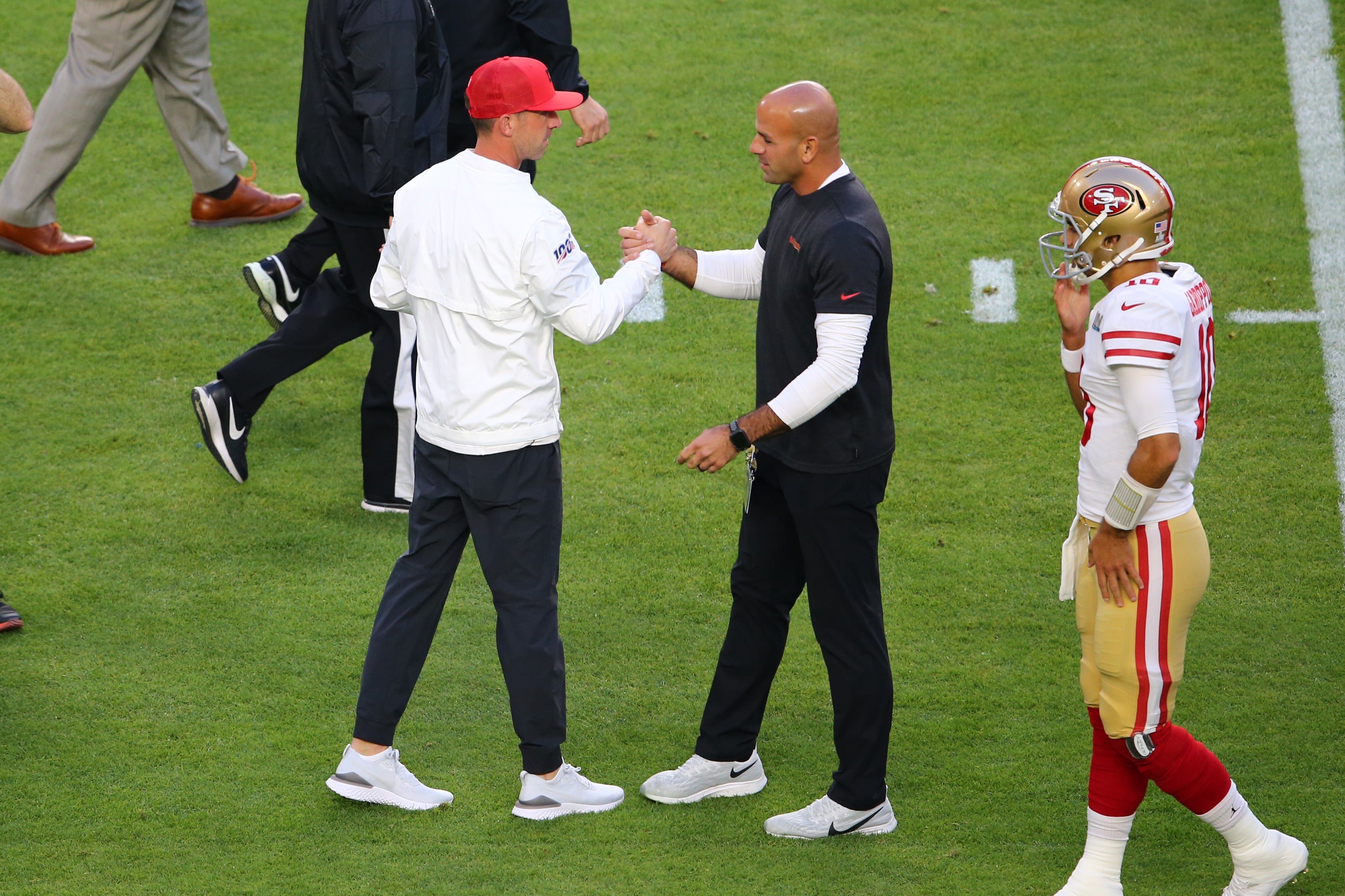 Feb 2, 2020; Miami Gardens, Florida, USA; San Francisco 49ers head coach Kyle Shanahan and San Francisco 49ers defensive coordinator Robert Saleh before Super Bowl LIV at Hard Rock Stadium.