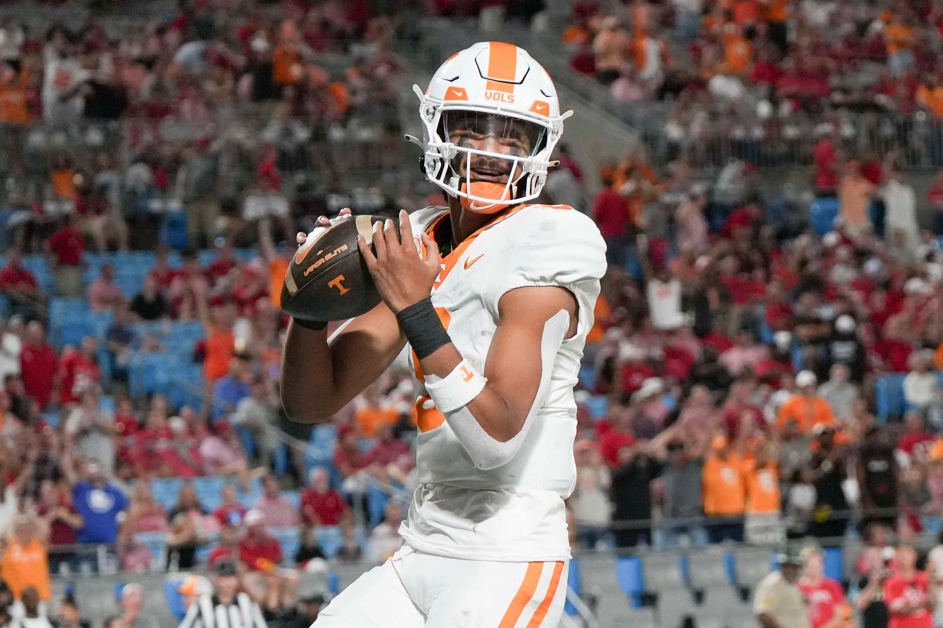 Tennessee quarterback Nico Iamaleava (8) runs into the end zone for a touchdown at the NCAA College football game between Tennessee and NC State on Saturday, Sept. 7, 2024 in Charlotte, NC.
