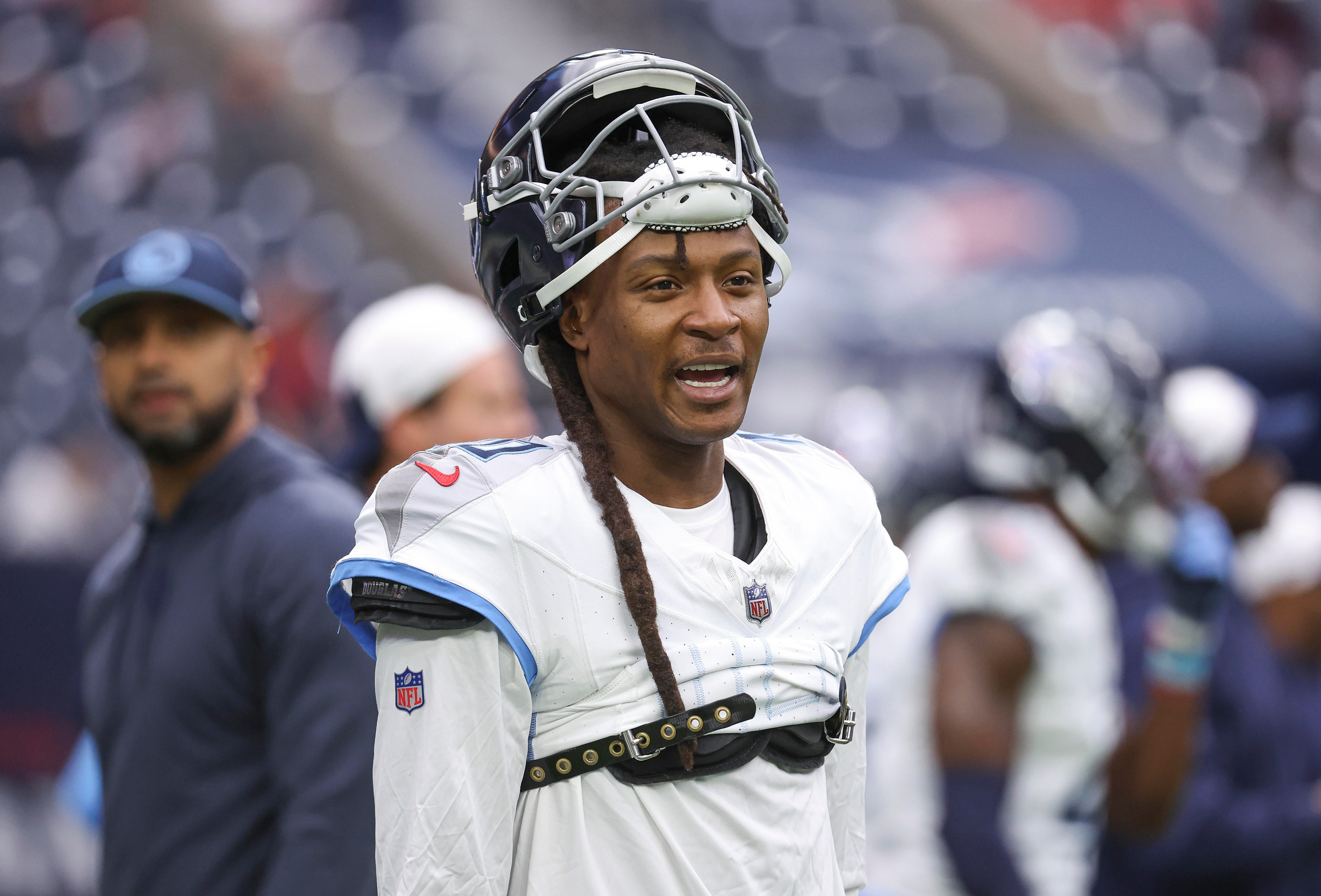 Tennessee Titans wide receiver DeAndre Hopkins (10) before the game against the Houston Texans at NRG Stadium. Troy Taormina-Imagn Images