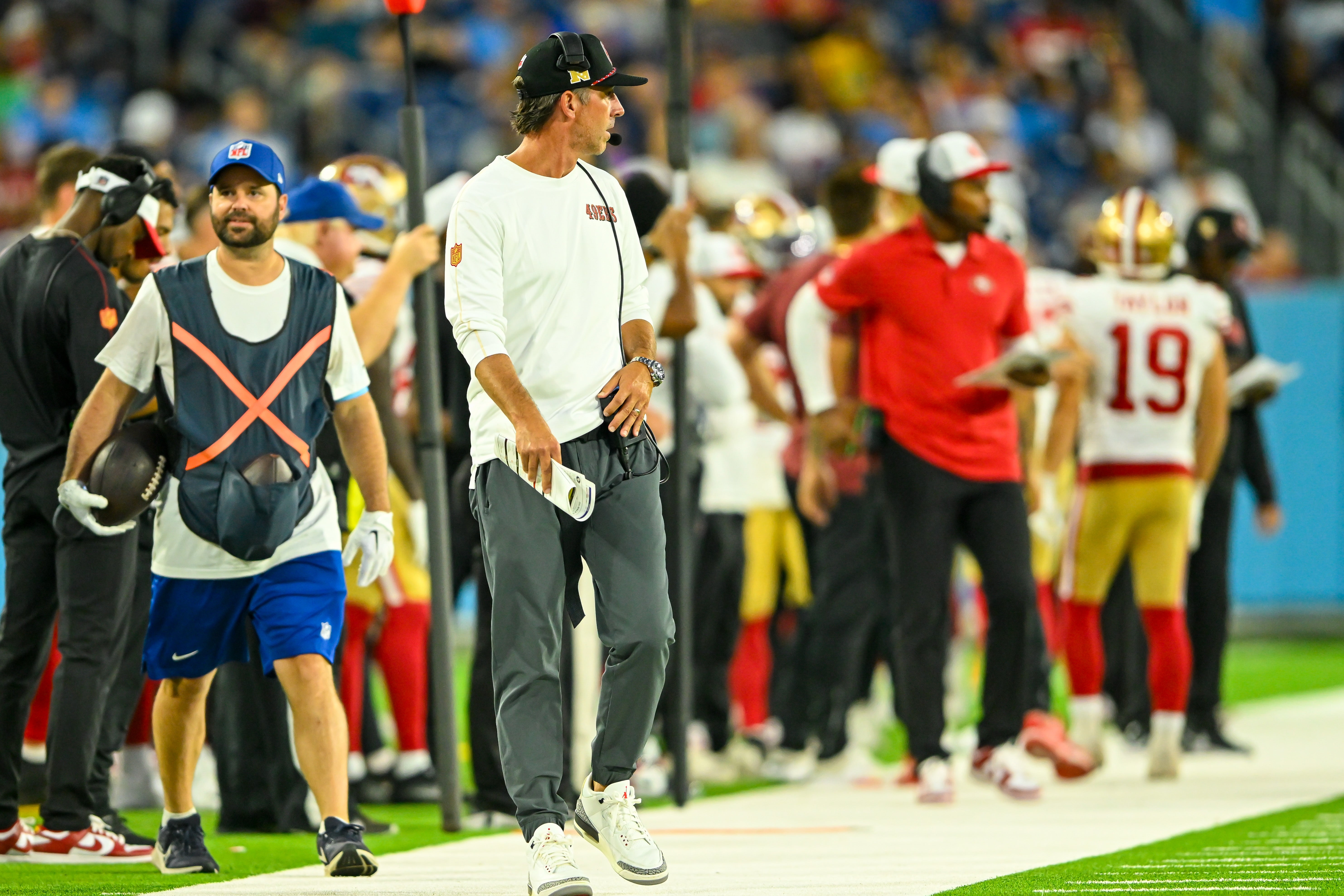 Aug 10, 2024; Nashville, Tennessee, USA; San Francisco 49ers head coach Kyle Shanahan paces the side lines during the second half at Nissan Stadium.