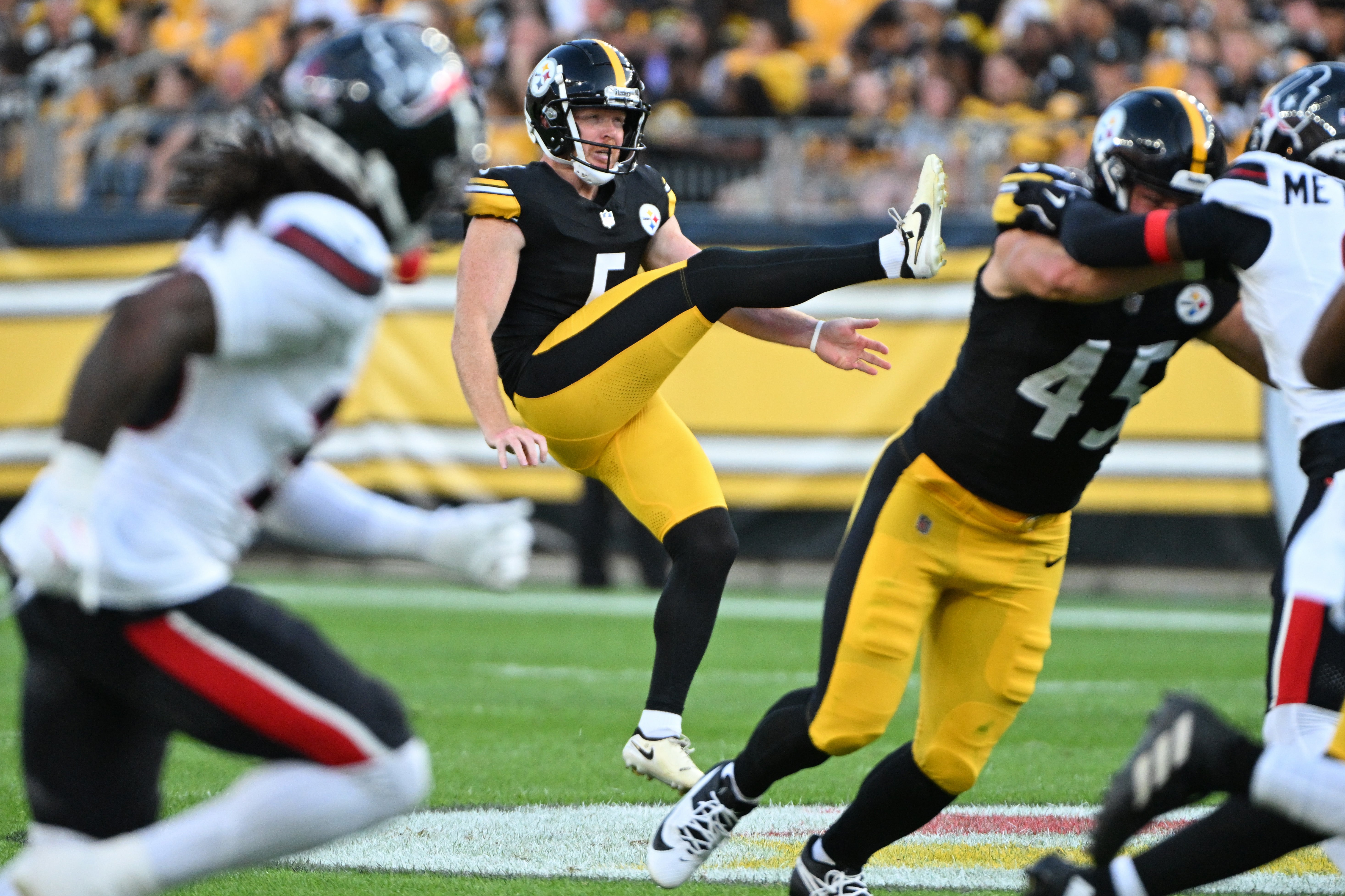 Aug 9, 2024; Pittsburgh, Pennsylvania, USA; Pittsburgh Steelers punter Cameron Johnston (5) punts against the Houston Texans during the first quarter at Acrisure Stadium. Mandatory Credit: Barry Reeger-Imagn Images