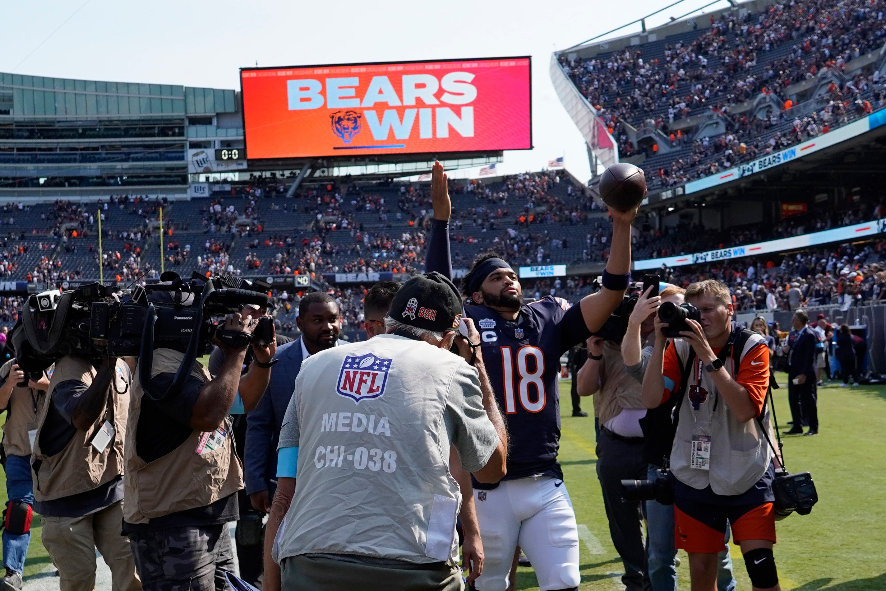 Sep 8, 2024; Chicago, Illinois, USA; Chicago Bears quarterback Caleb Williams (18) celebrates after the Bears beat the Tennessee Titans at Soldier Field.