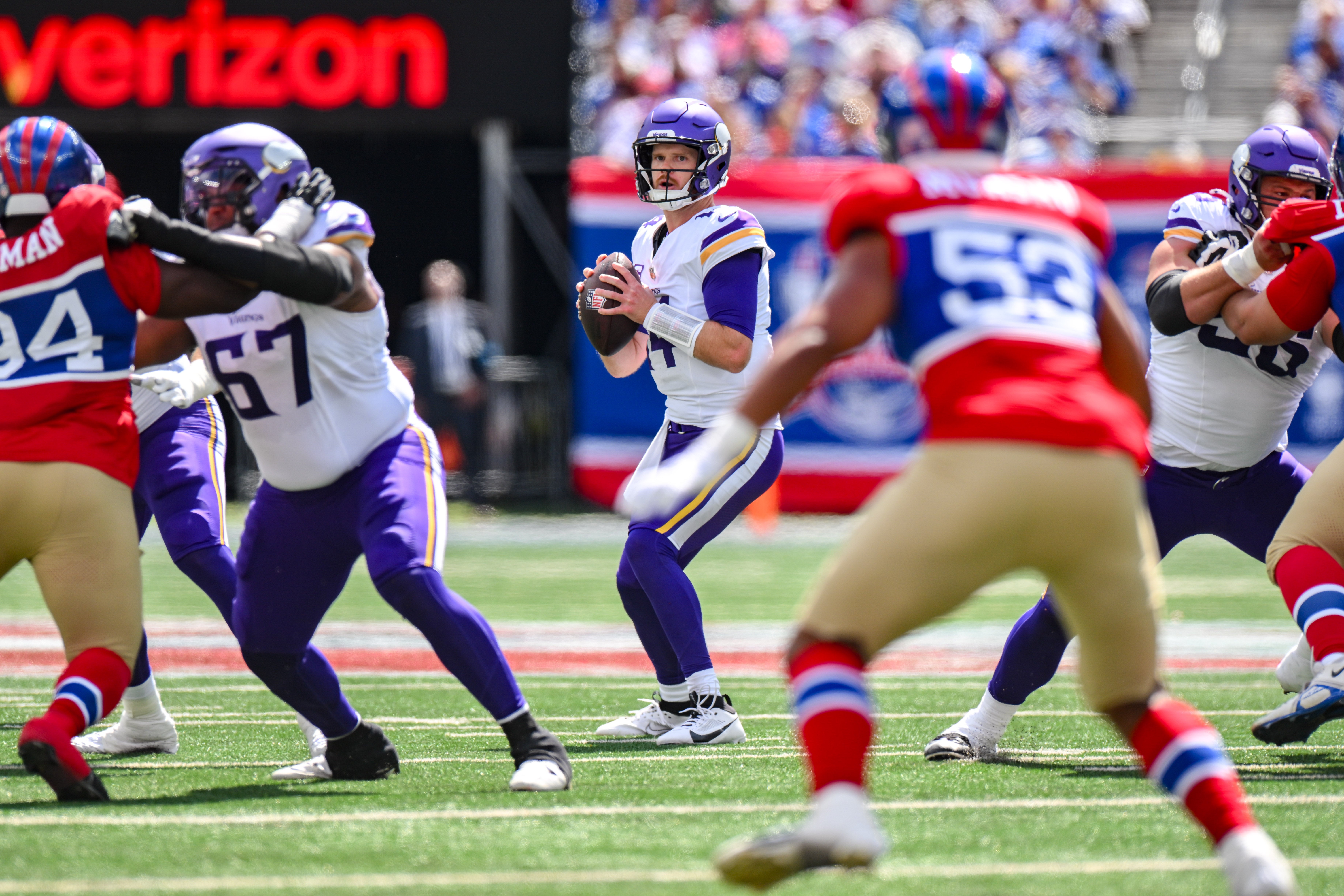 Sep 8, 2024; East Rutherford, New Jersey, USA; Minnesota Vikings quarterback Sam Darnold (14) looks to pass the ball against the New York Giants during the first half at MetLife Stadium.