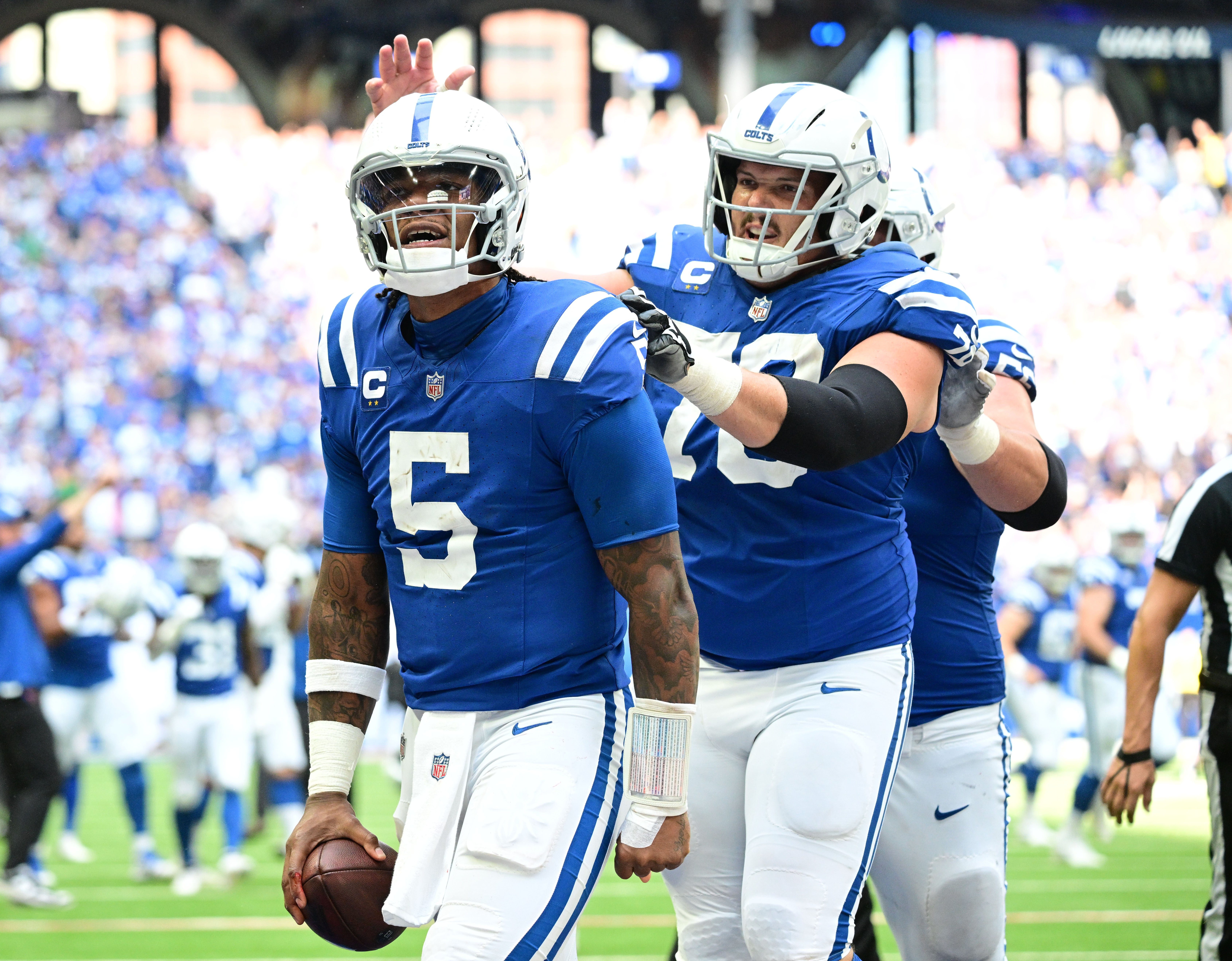 Sep 8, 2024; Indianapolis, Indiana, USA; Indianapolis Colts quarterback Anthony Richardson (5) celebrates a touchdown during the second half against the Houston Texans at Lucas Oil Stadium.