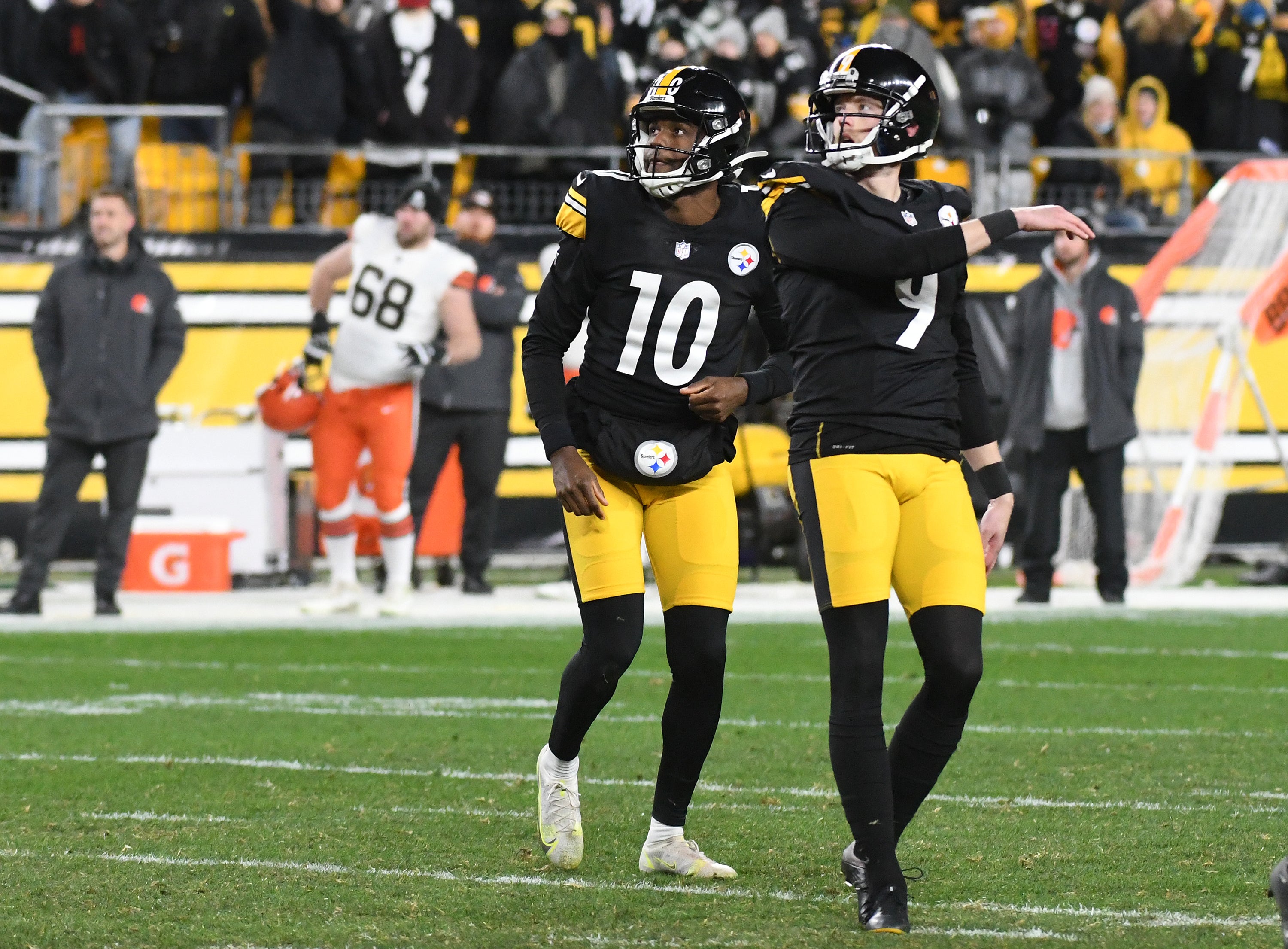 Jan 3, 2022; Pittsburgh, Pennsylvania, USA; Pittsburgh Steelers kicker Chris Boswell (9) and holder Corliss Waitman (10) watch a firld goal make it against the Cleveland Browns during the fourth quarter at Heinz Field. The Steelers won 26-14. Mandatory Credit: Philip G. Pavely-Imagn Images