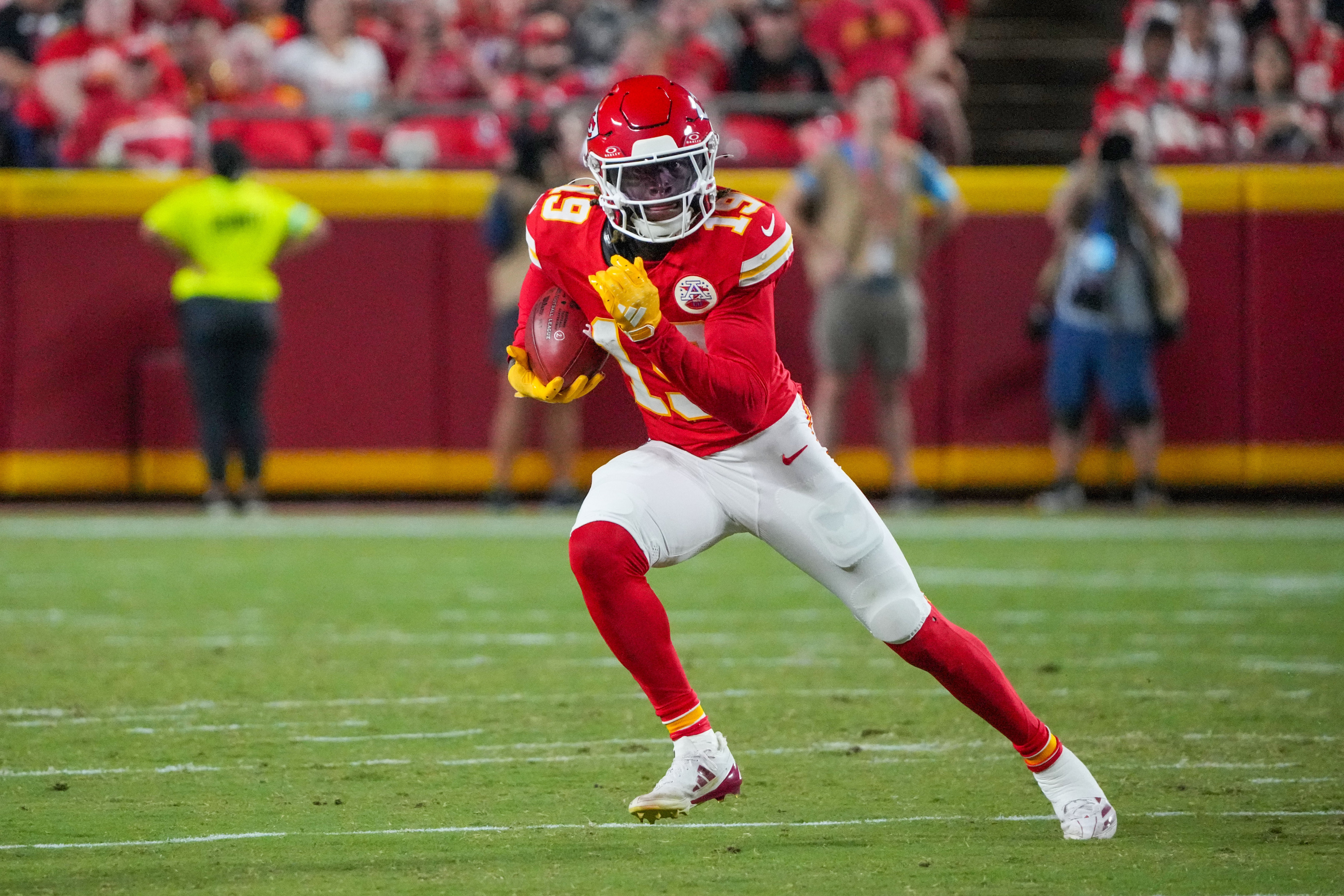 Aug 22, 2024; Kansas City, Missouri, USA; Kansas City Chiefs wide receiver Kadarius Toney (19) returns a kick against the Chicago Bears during the first half at GEHA Field at Arrowhead Stadium.