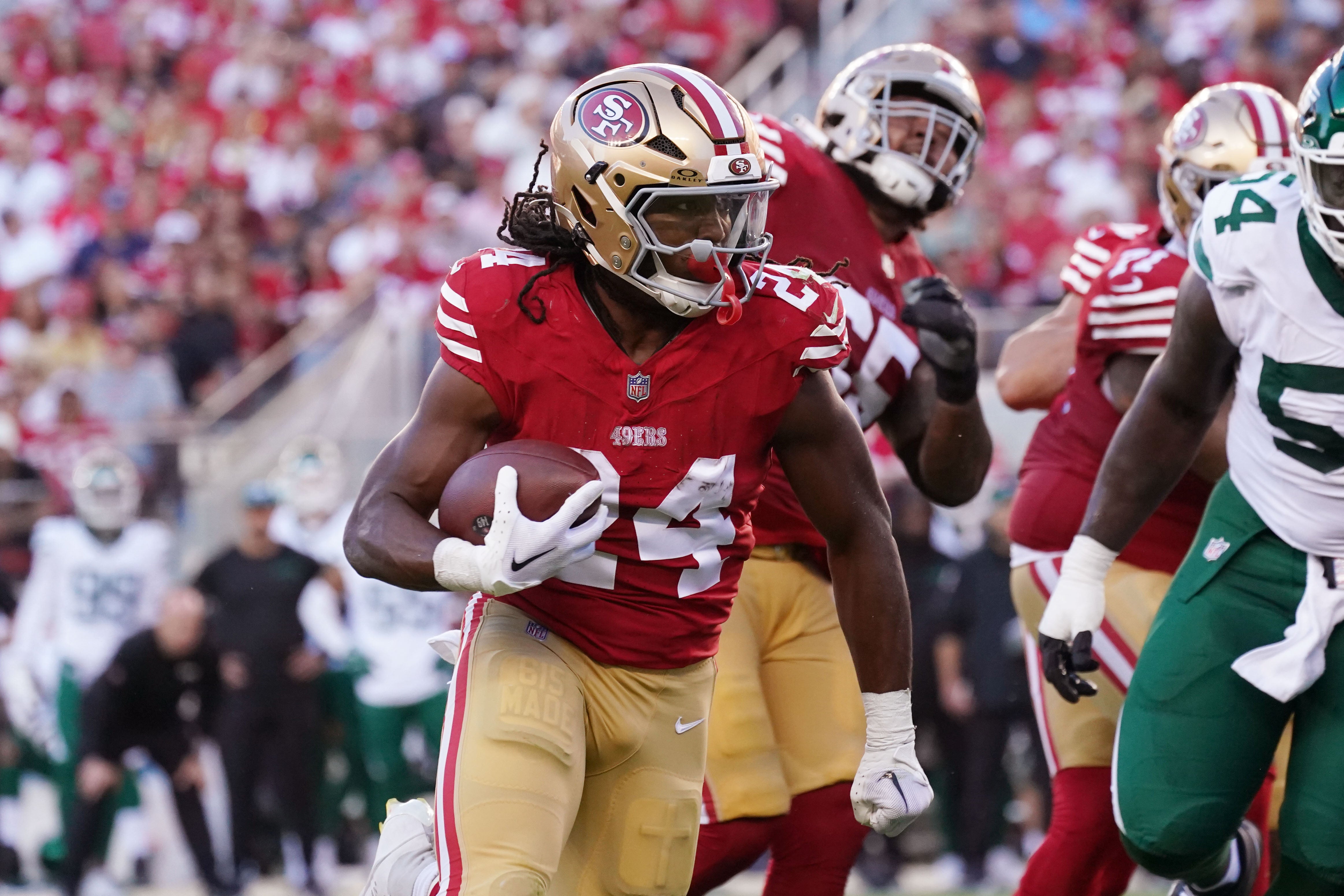 Sep 9, 2024; Santa Clara, California, USA; San Francisco 49ers running back Jordan Mason (24) runs during the second quarter against the New York Jets at Levi's Stadium.