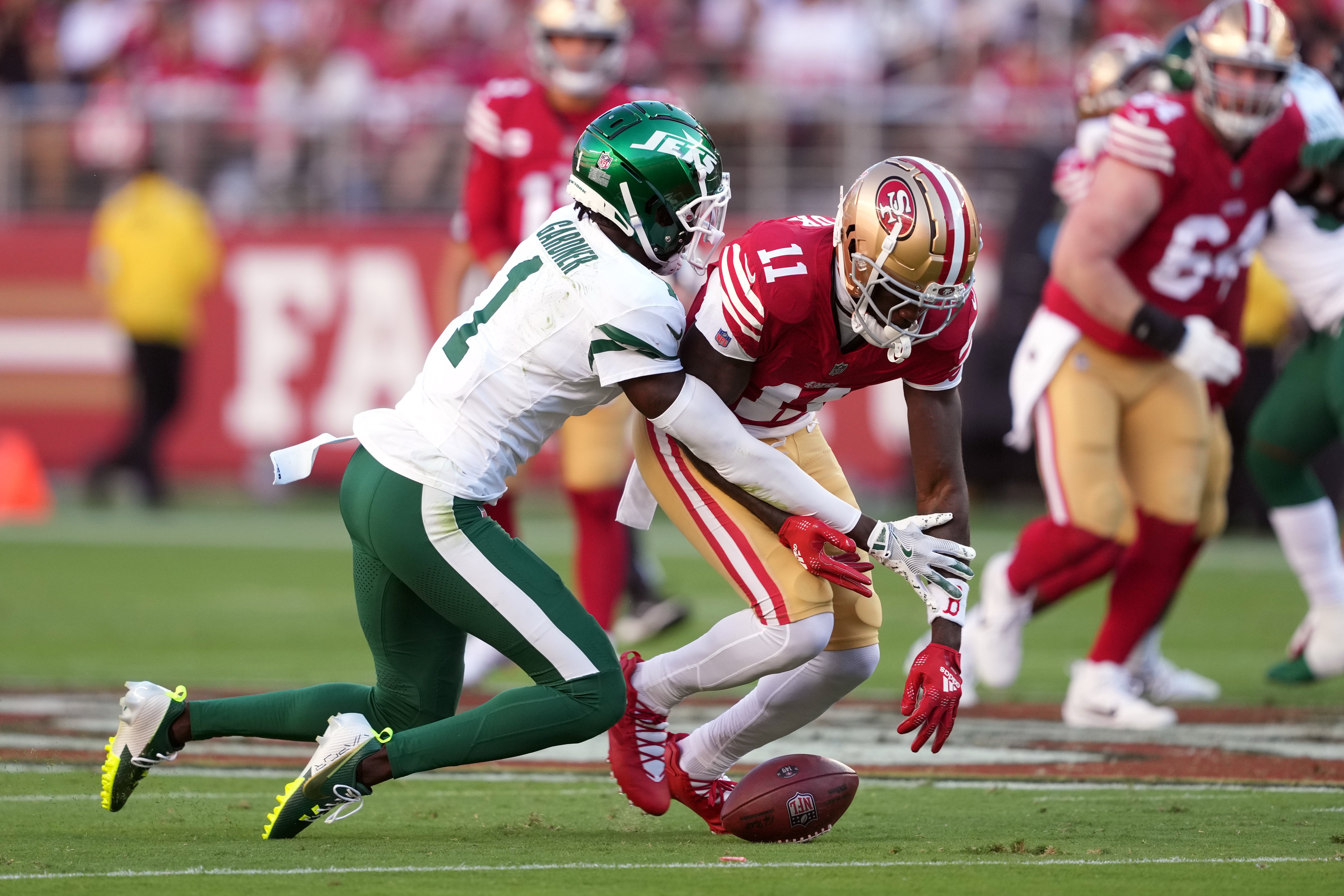 Sep 9, 2024; Santa Clara, California, USA; New York Jets cornerback Sauce Gardner (1) defends a pass to San Francisco 49ers wide receiver Brandon Aiyuk (11) during the first quarter at Levi's Stadium.