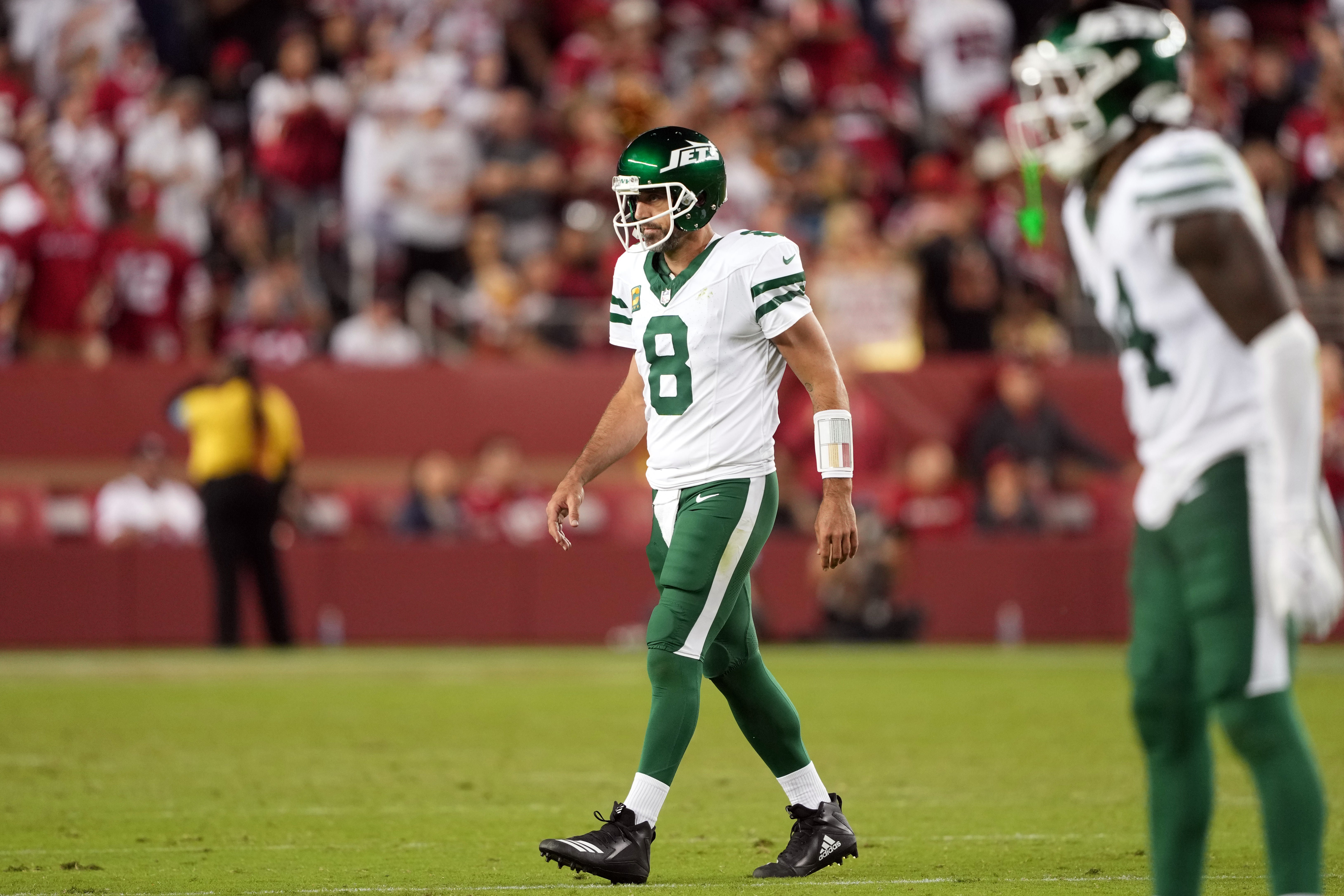 New York Jets quarterback Aaron Rodgers (8) walks off of the field during the fourth quarter against the San Francisco 49ers at Levi's Stadium.