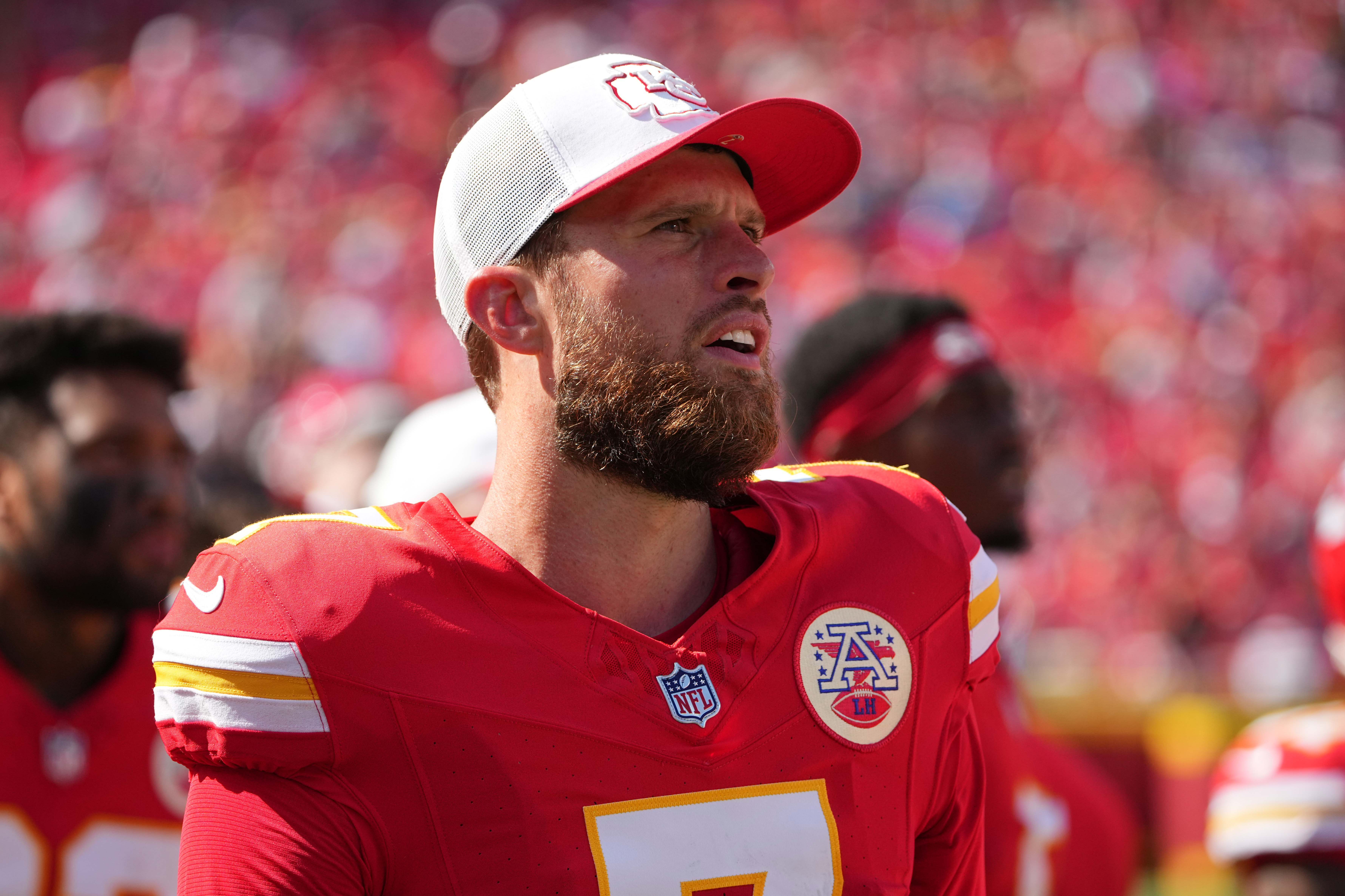 Aug 17, 2024; Kansas City, Missouri, USA; Kansas City Chiefs kicker Harrison Butker (7) on the sidelines against the Detroit Lions during the game at GEHA Field at Arrowhead Stadium.