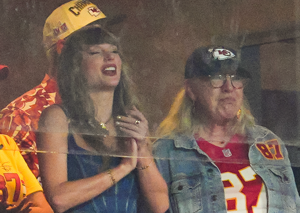 Sep 5, 2024; Kansas City, Missouri, USA; Recording artist Taylor Swift and Donna Kelce watch the action during the second half between the Baltimore Ravens and the Kansas City Chiefs at GEHA Field at Arrowhead Stadium.