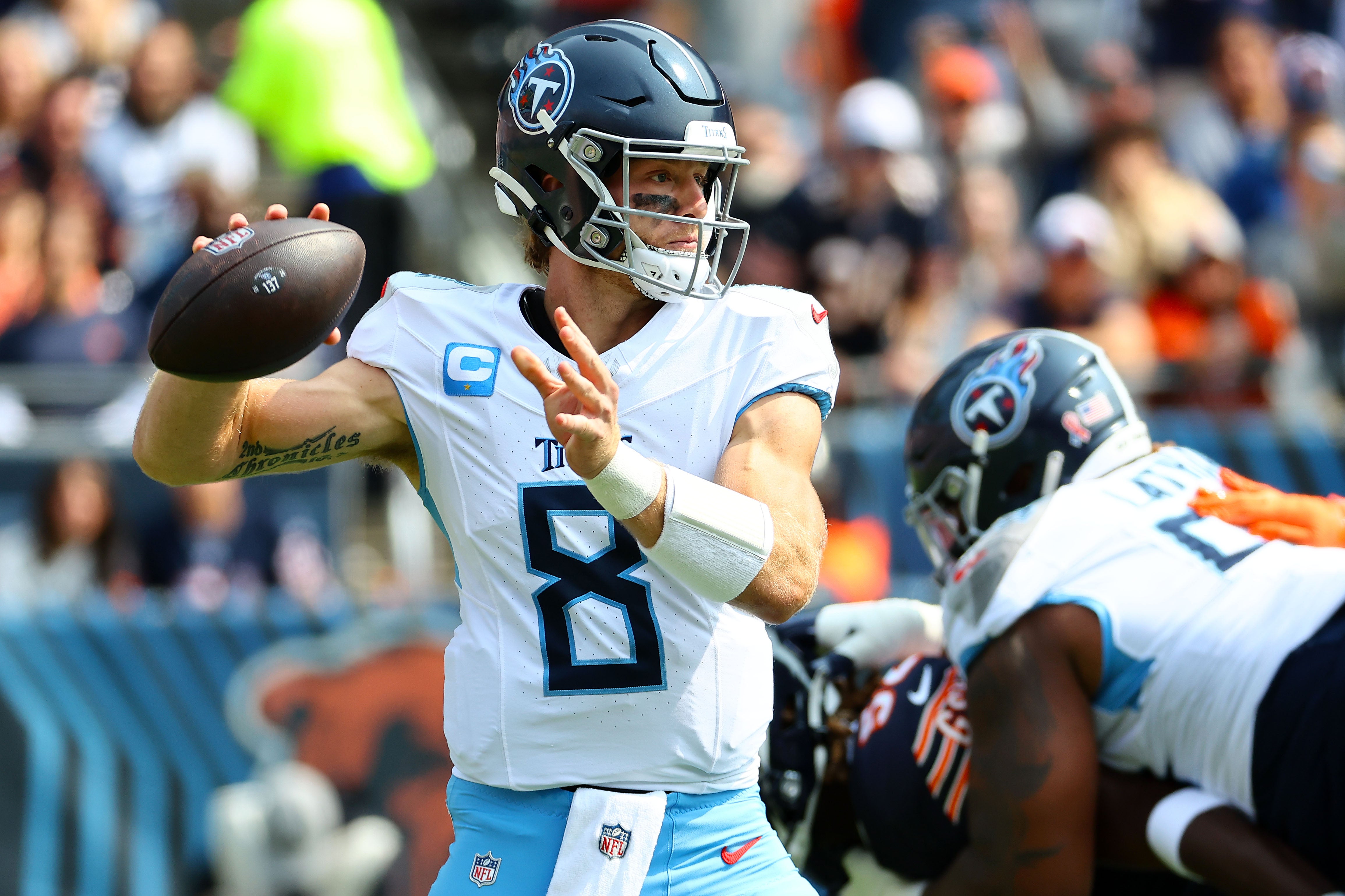 Tennessee Titans quarterback Will Levis (8) drops back to pass against the Chicago Bears during the first quarter at Soldier Field. Mike Dinovo-Imagn Images