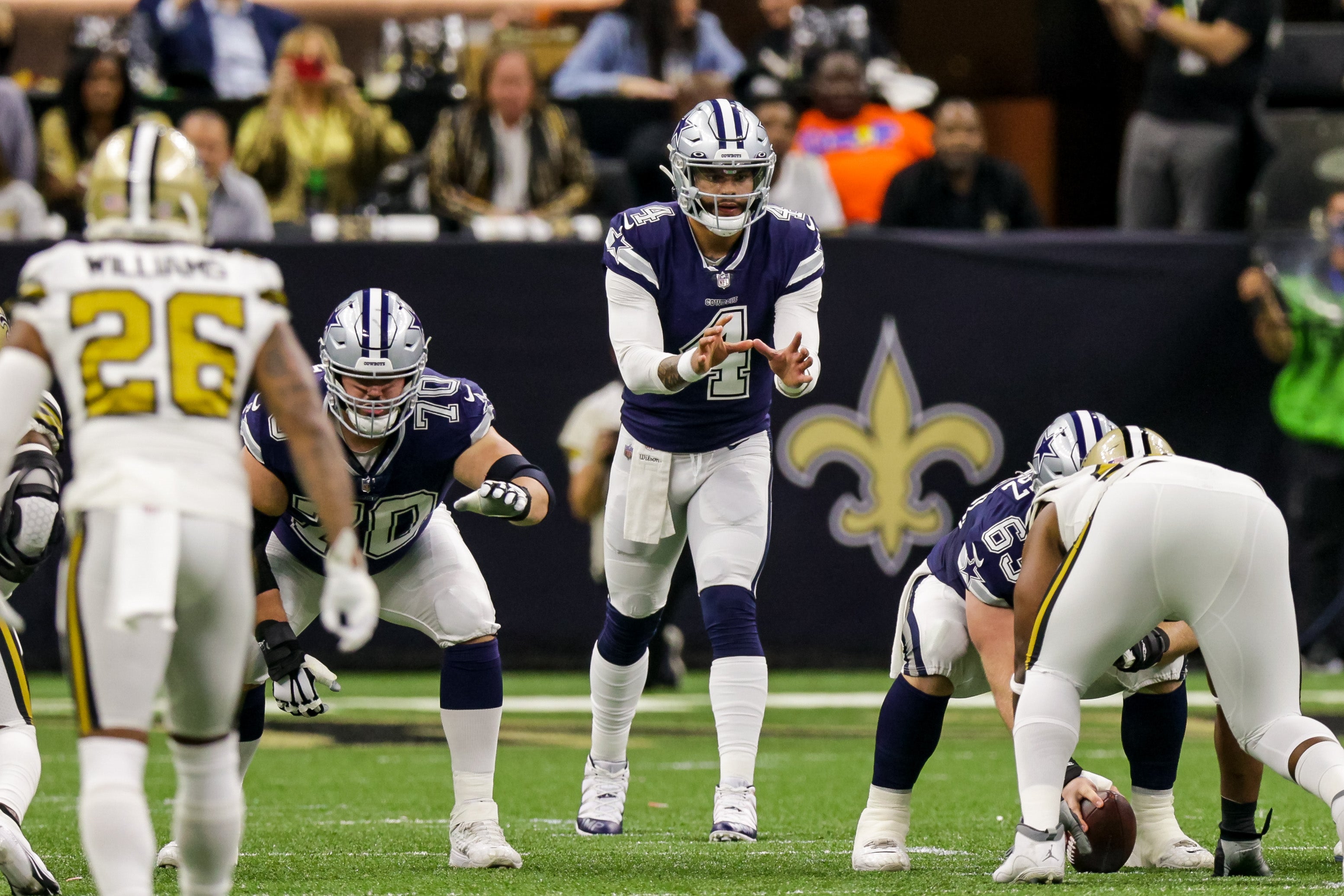 Dallas Cowboys quarterback Dak Prescott (4) against New Orleans Saints cornerback P.J. Williams (26) during the first half at Caesars Superdome.