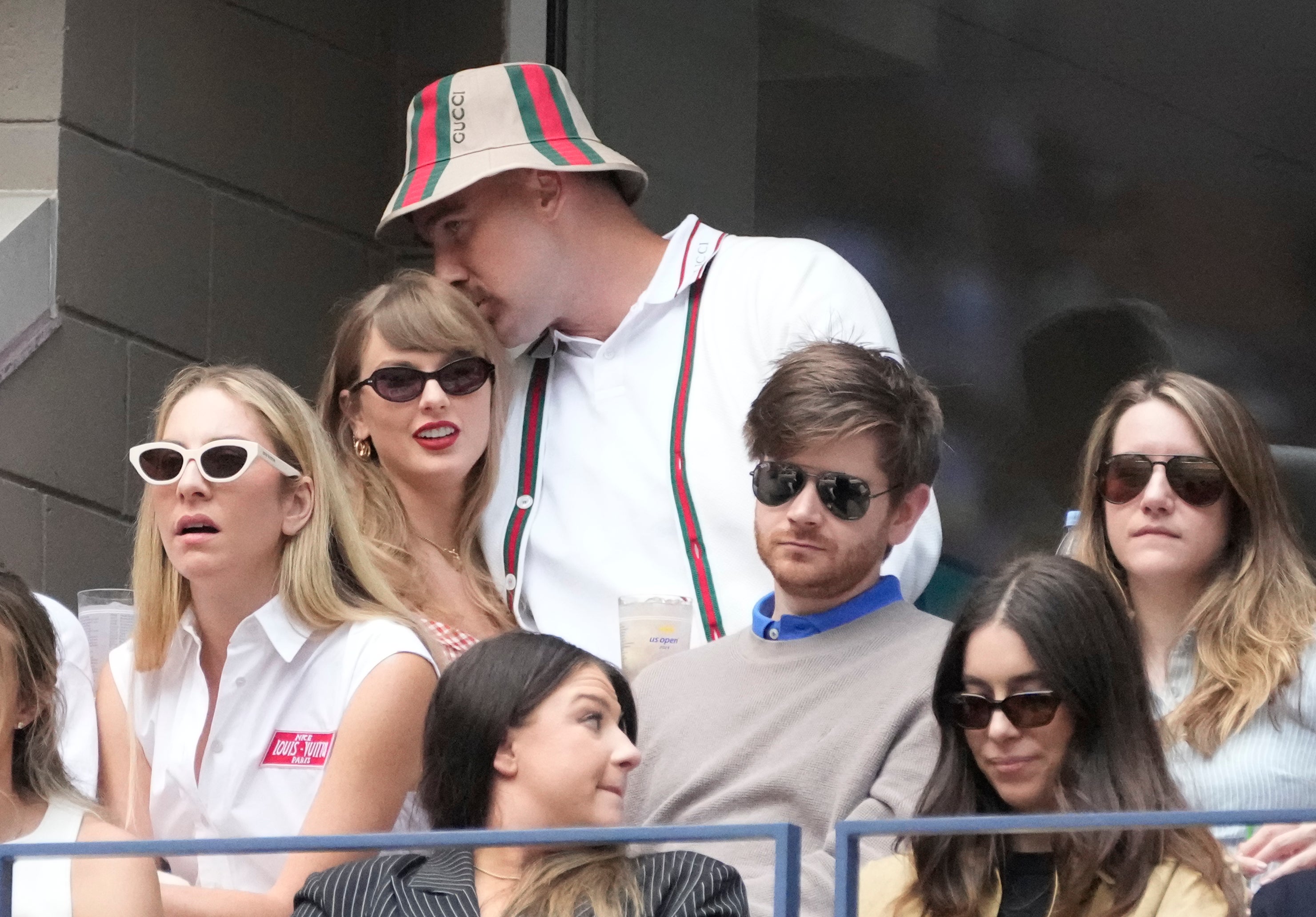 Sep 8, 2024; Flushing, NY, USA; Recording artist Taylor Swift and Kansas City Chiefs tight end Travis Kelce talk during the men’s singles final of the 2024 U.S. Open tennis tournament at USTA Billie Jean King National Tennis Center.