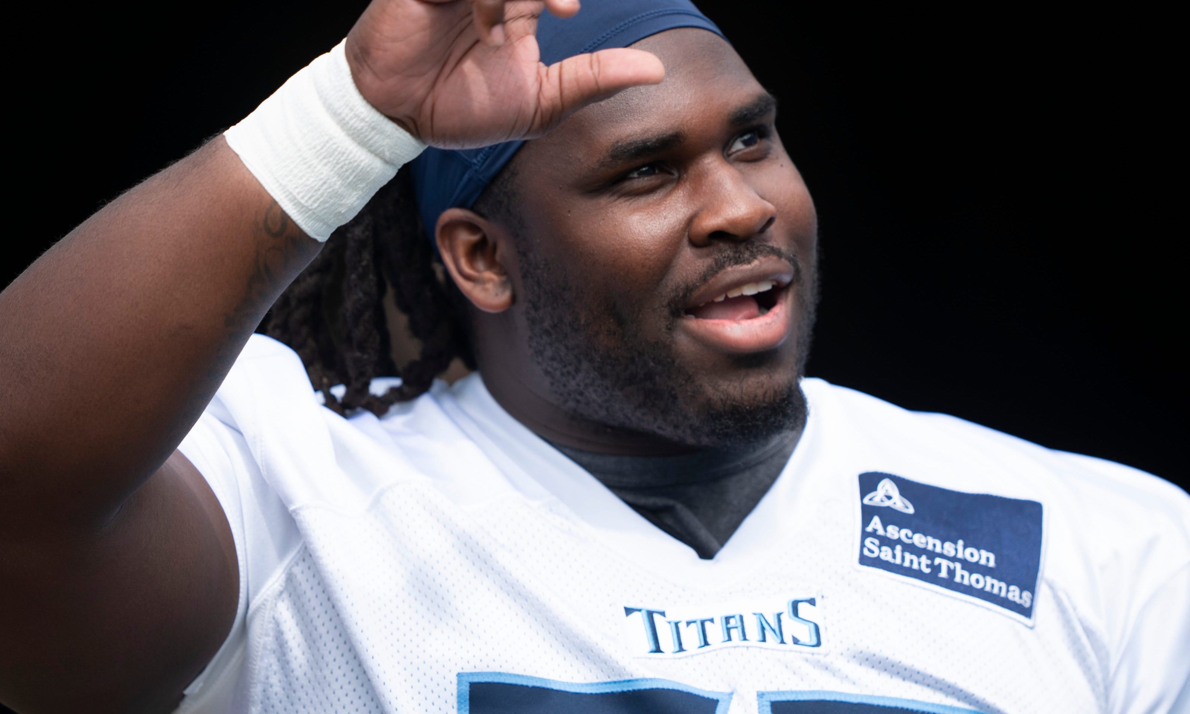 Tennessee Titans defensive tackle T'Vondre Sweat (93) waves to fans at Nissan Stadium in Nashville, Tenn., Saturday, July 27, 2024. The Titans hosted Back Together Weekend to allow fans to get a look ... Denny Simmons/The Tennessean-USA TODAY NETWORK