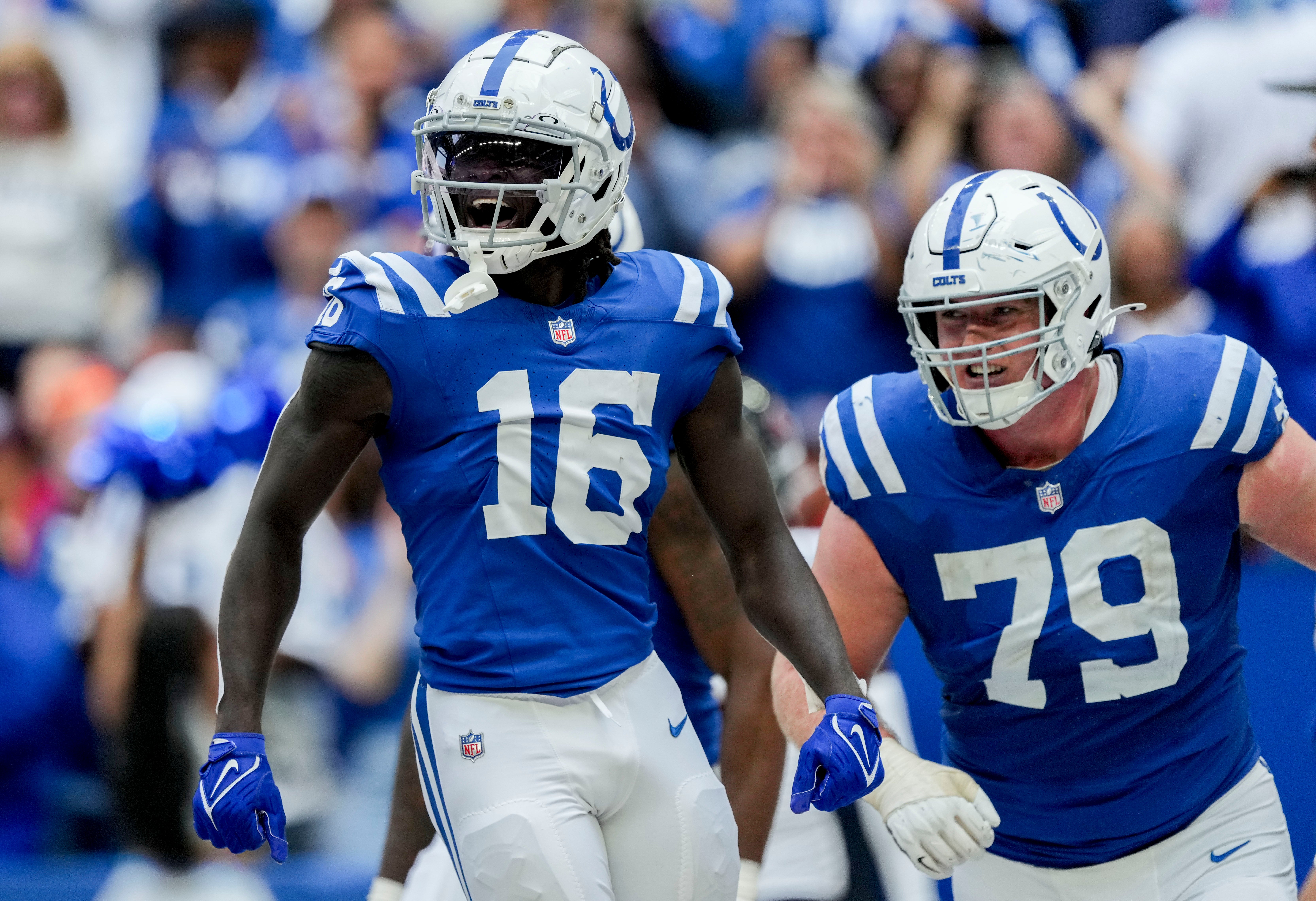 Sep 8, 2024; Indianapolis, Indiana, USA; Indianapolis Colts wide receiver Ashton Dulin (16) celebrates a touchdown Sunday, Sept. 8, 2024, during a game against the Houston Texans at Lucas Oil Stadium.