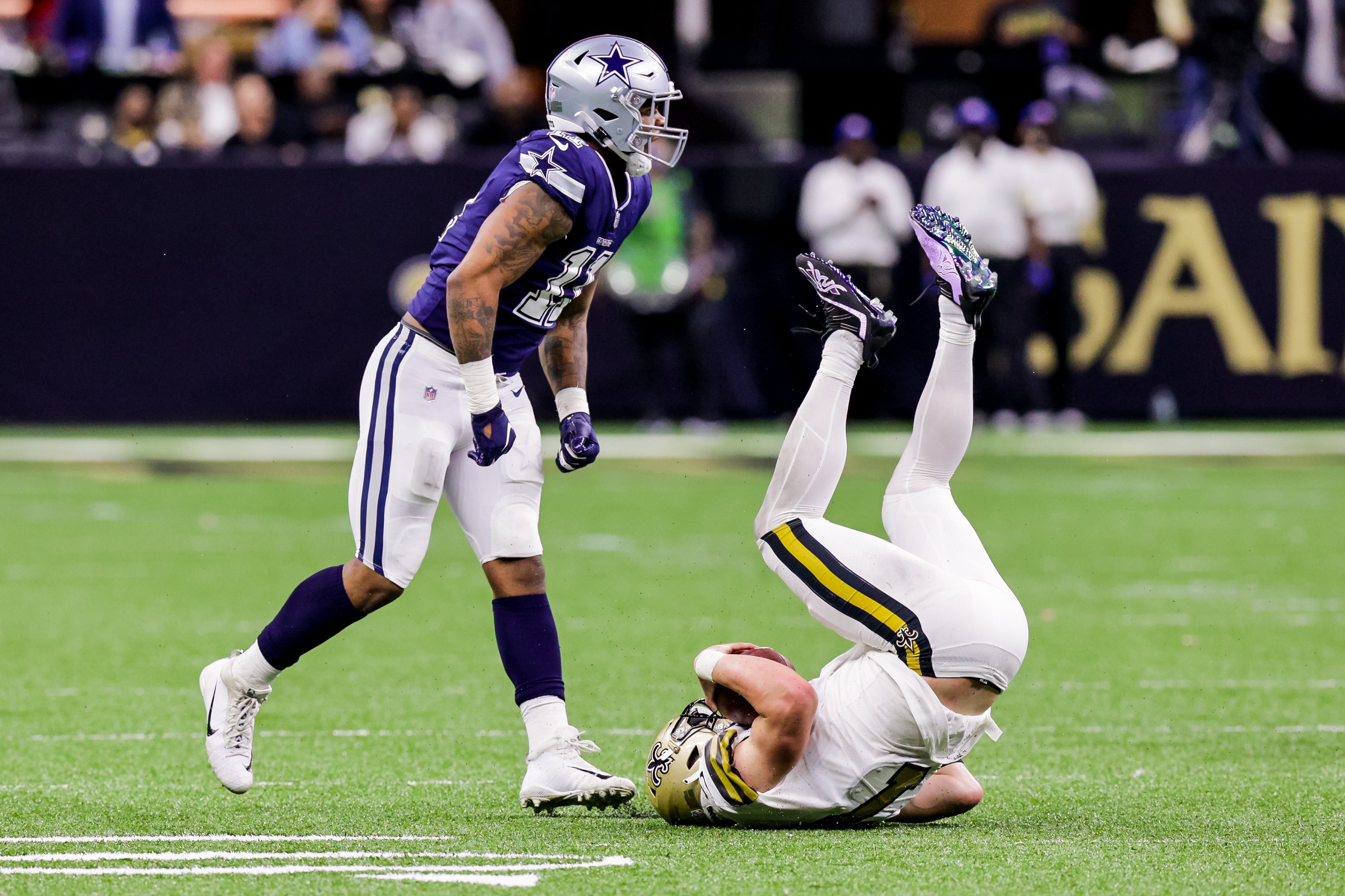 Dallas Cowboys wide receiver Cedrick Wilson (1) sacks New Orleans Saints quarterback Taysom Hill (7) during the second half at Caesars Superdome.