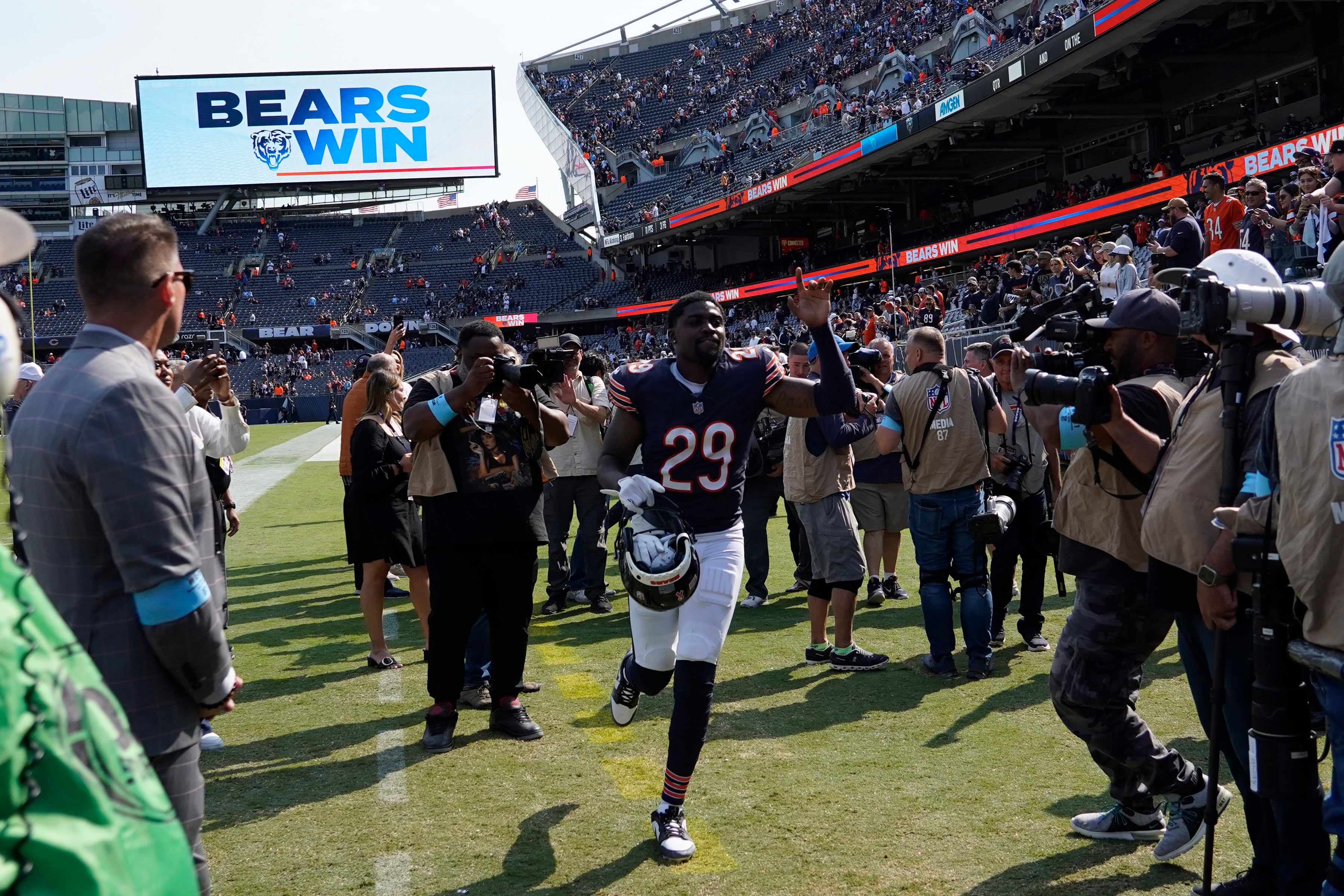 Sep 8, 2024; Chicago, Illinois, USA; Chicago Bears cornerback Tyrique Stevenson (29) celebrates a win against the Tennessee Titans at Soldier Field.