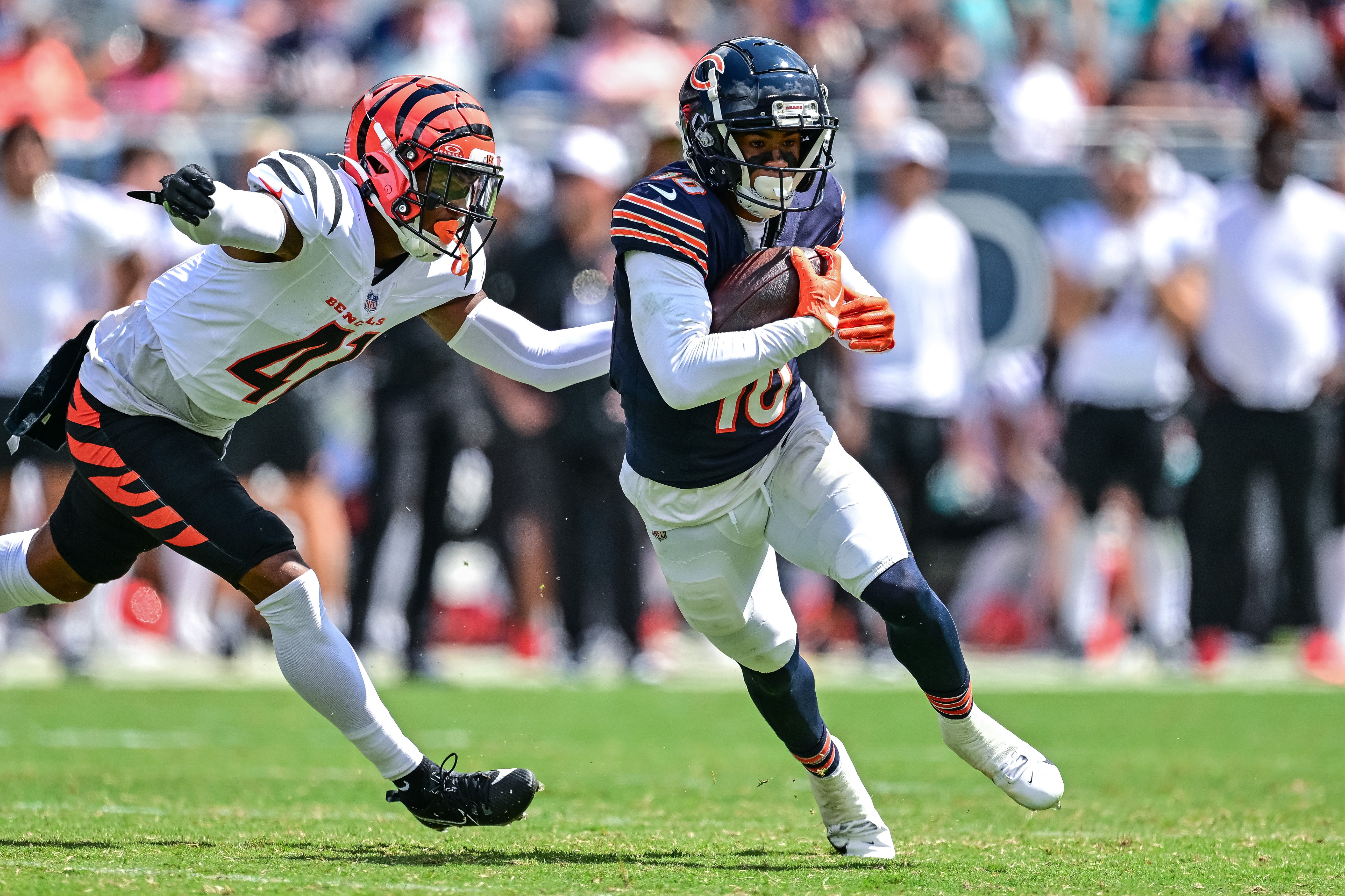 Aug 17, 2024; Chicago, Illinois, USA; Chicago Bears wide receiver Tyler Scott (10) runs after a catch against the Cincinnati Bengals during the third quarter at Soldier Field.