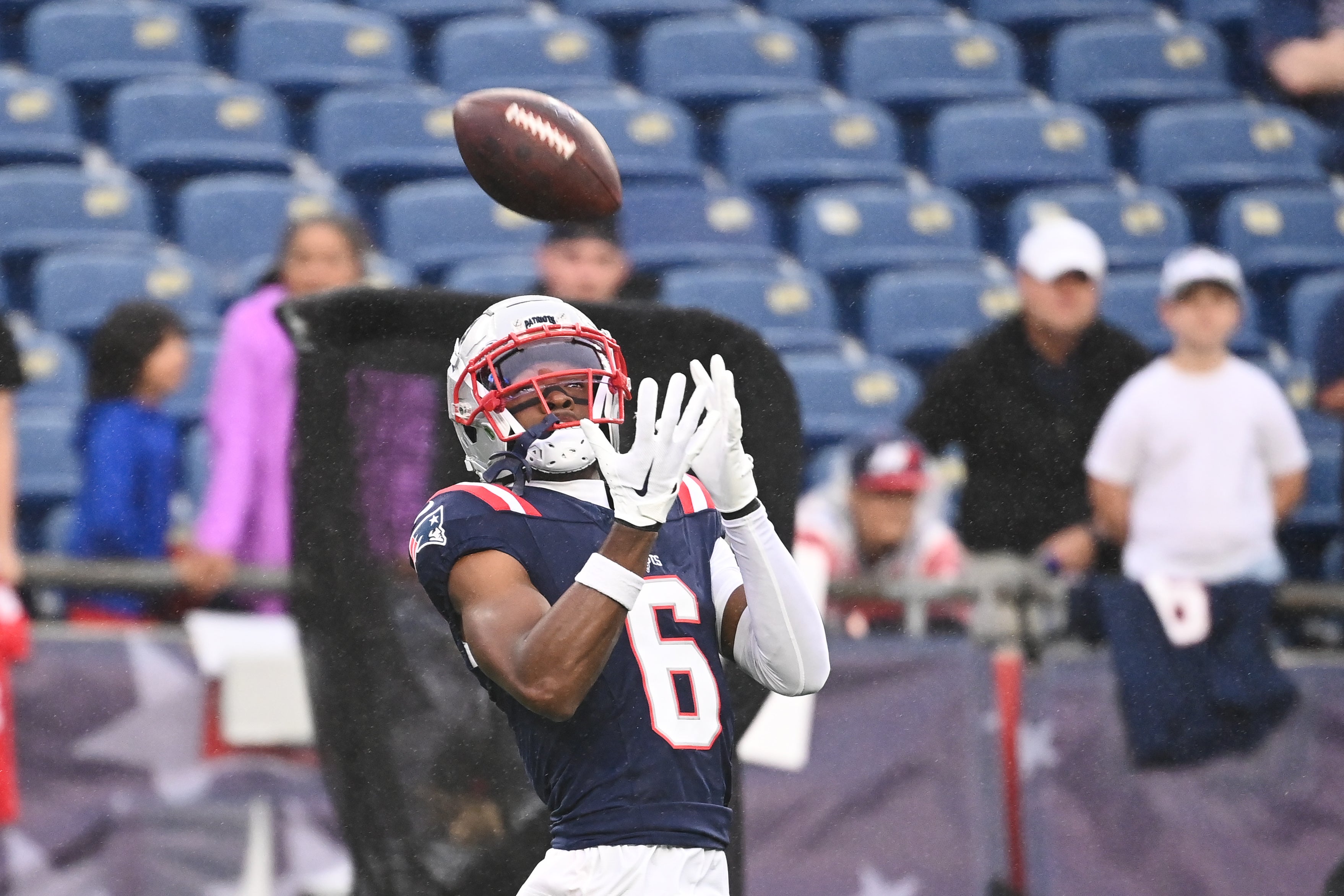 August 8, 2024; Foxborough, MA, USA; New England Patriots wide receiver Javon Baker (6) warms up before a game against the Carolina Panthers at Gillette Stadium.