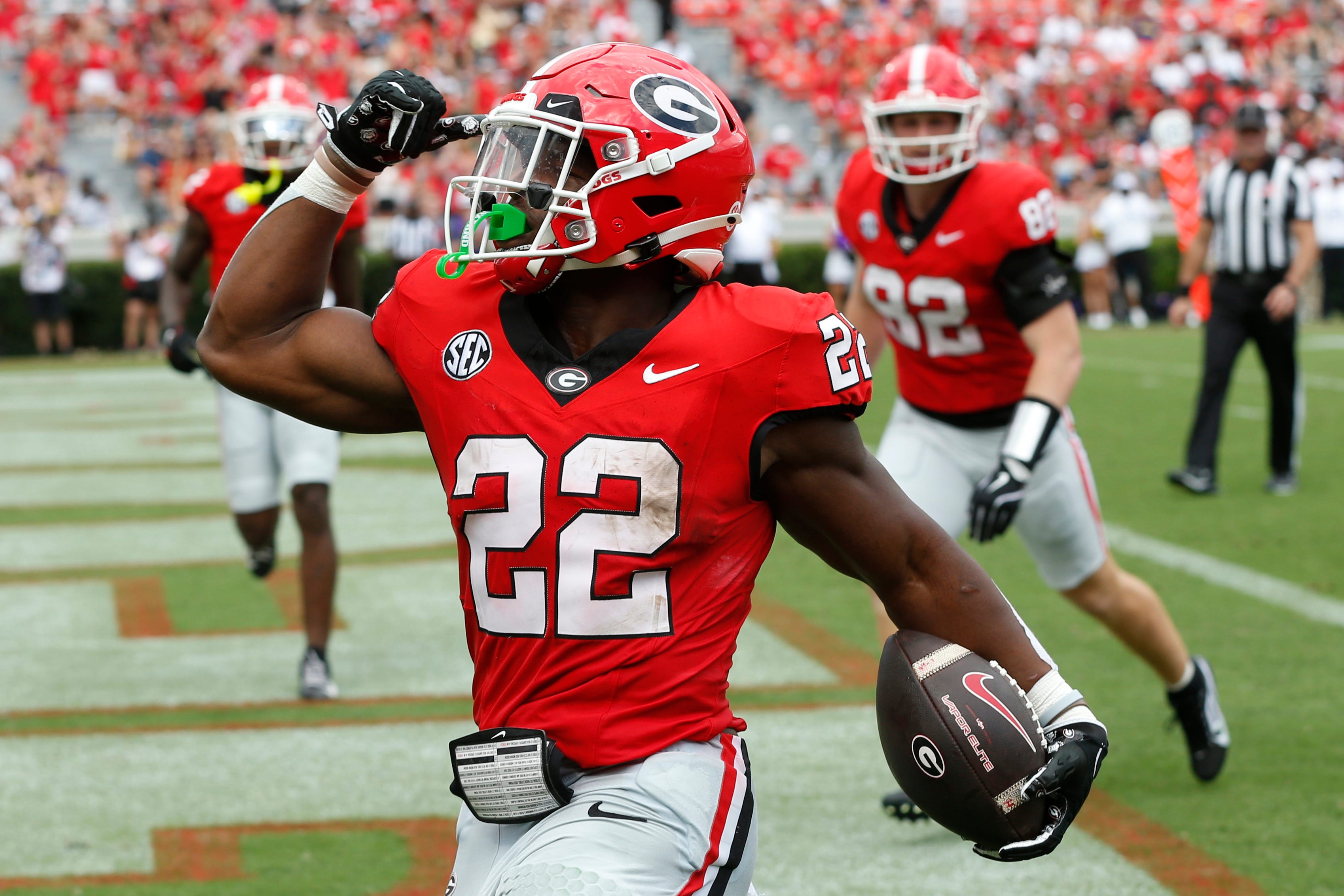 Georgia running back Branson Robinson (22) celebrates after scoring a touchdown during the second half of a NCAA Aflac Kickoff game against Tennessee Tech in Athens, Ga., on Saturday, Sept. 7, 2024.