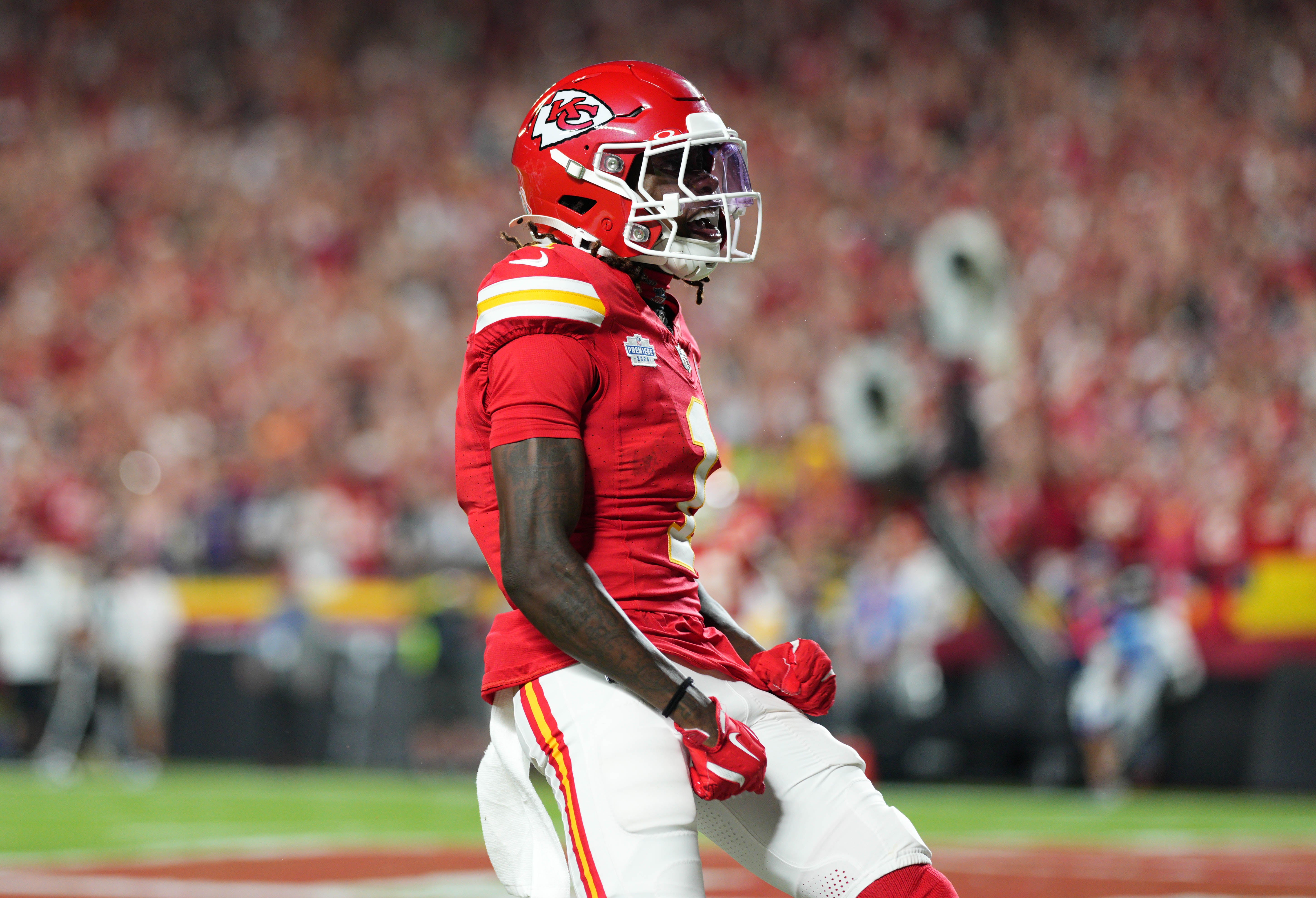 Sep 5, 2024; Kansas City, Missouri, USA; Kansas City Chiefs wide receiver Xavier Worthy (1) celebrates after scoring a touchdown during the first half against the Baltimore Ravens at GEHA Field at Arrowhead Stadium.