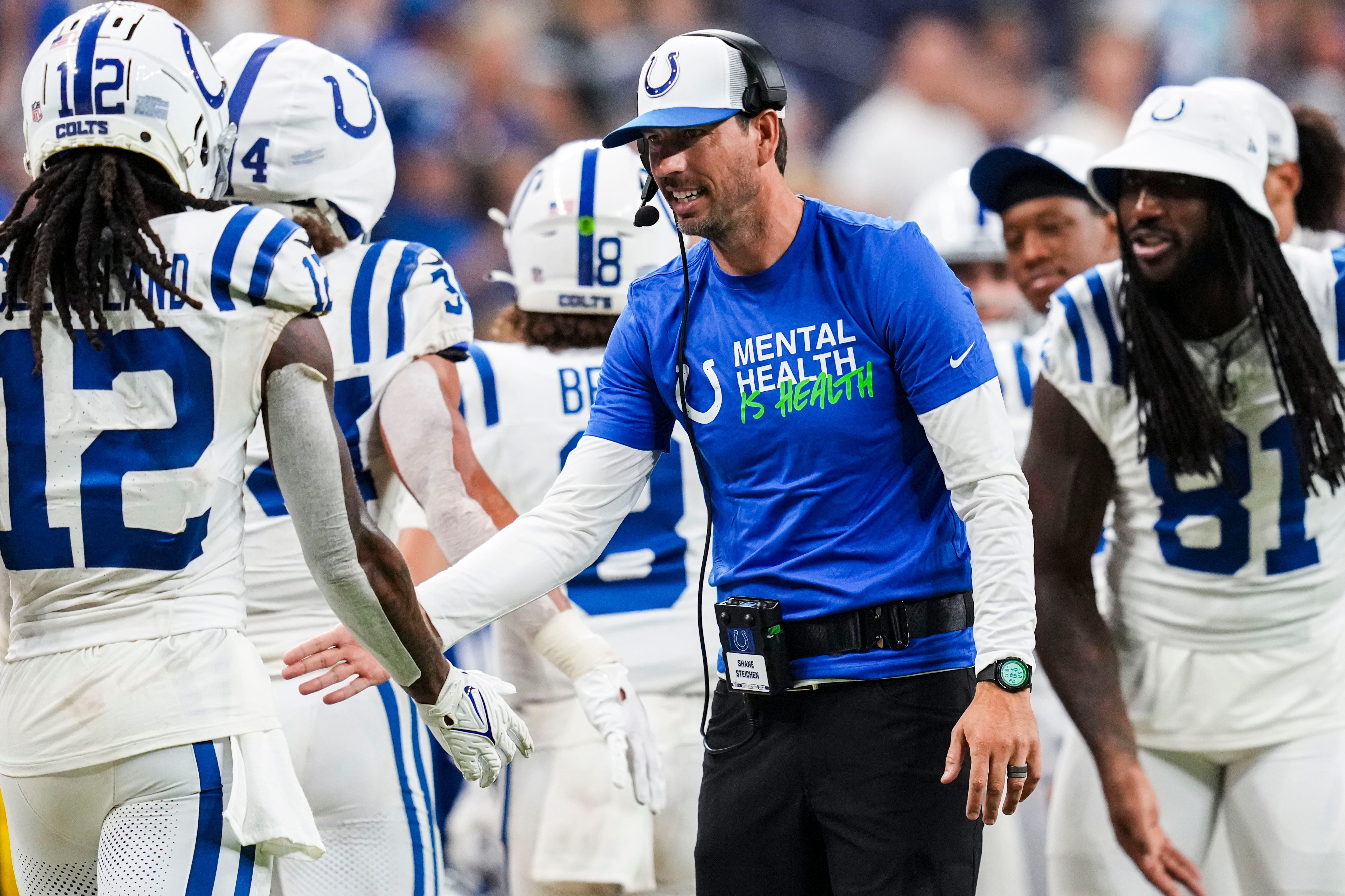 Indianapolis Colts head coach Shane Steichen high fives his team Saturday, Aug. 17, 2024, during a preseason game between the Indianapolis Colts and the Arizona Cardinals at Lucas Oil Stadium in Indianapolis. The Colts defeated the Cardinals, 21-13.