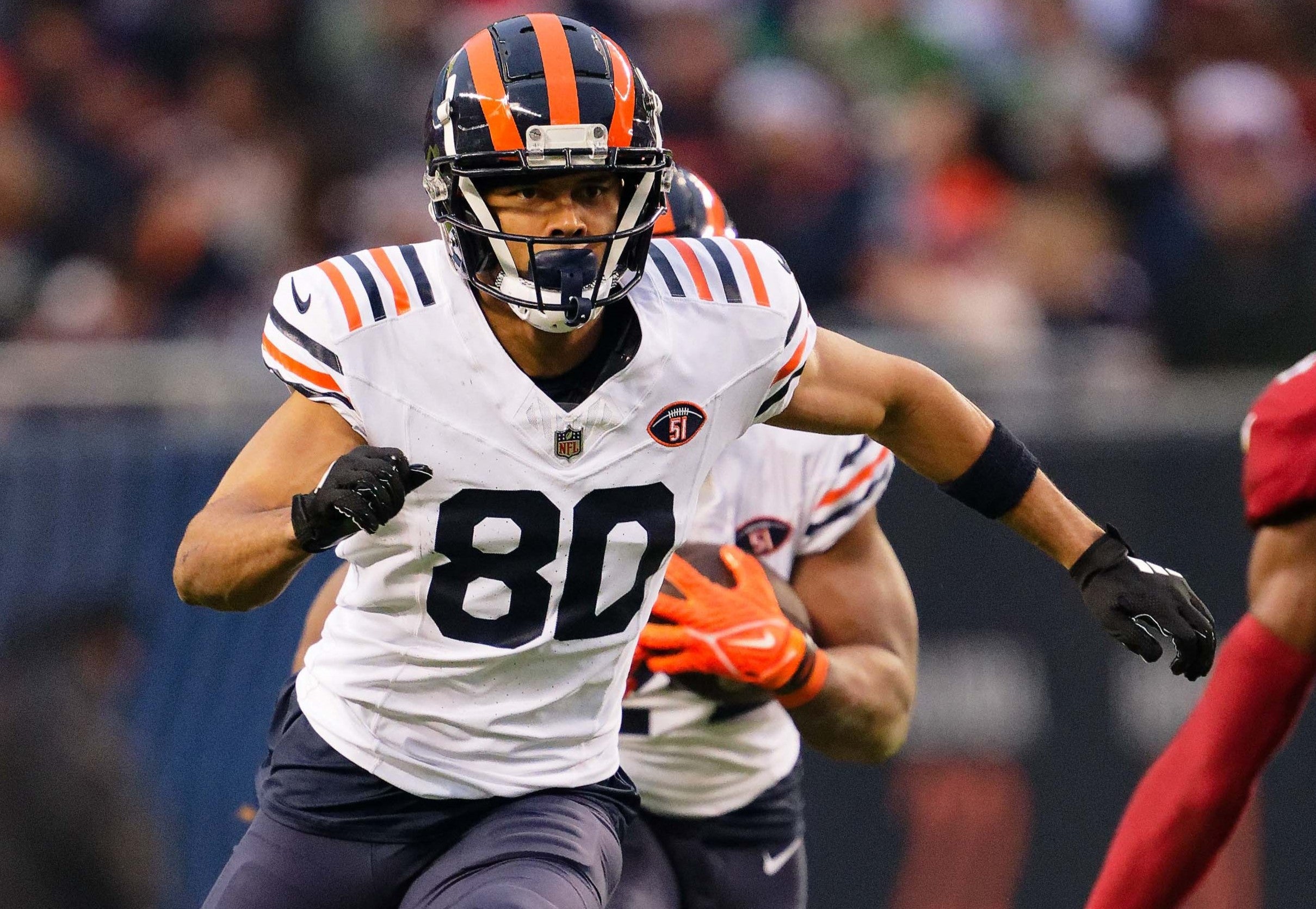 Dec 24, 2023; Chicago, Illinois, USA; Chicago Bears wide receiver Collin Johnson (80) blocks downfield against the Arizona Cardinals at Soldier Field.