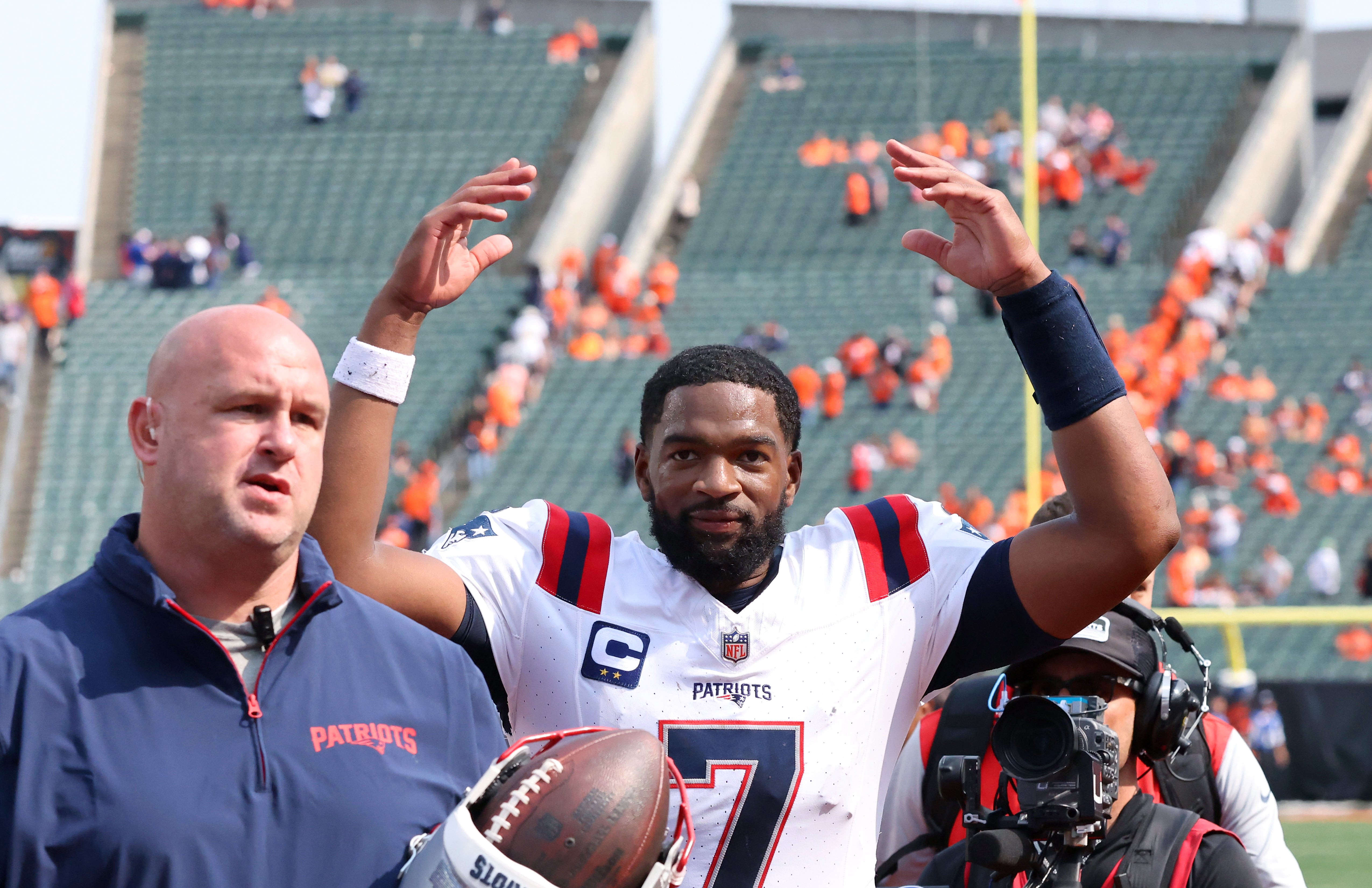 Sep 8, 2024; Cincinnati, Ohio, USA; New England Patriots quarterback Jacoby Brissett celebrates following the win over the Cincinnati Bengals at Paycor Stadium.