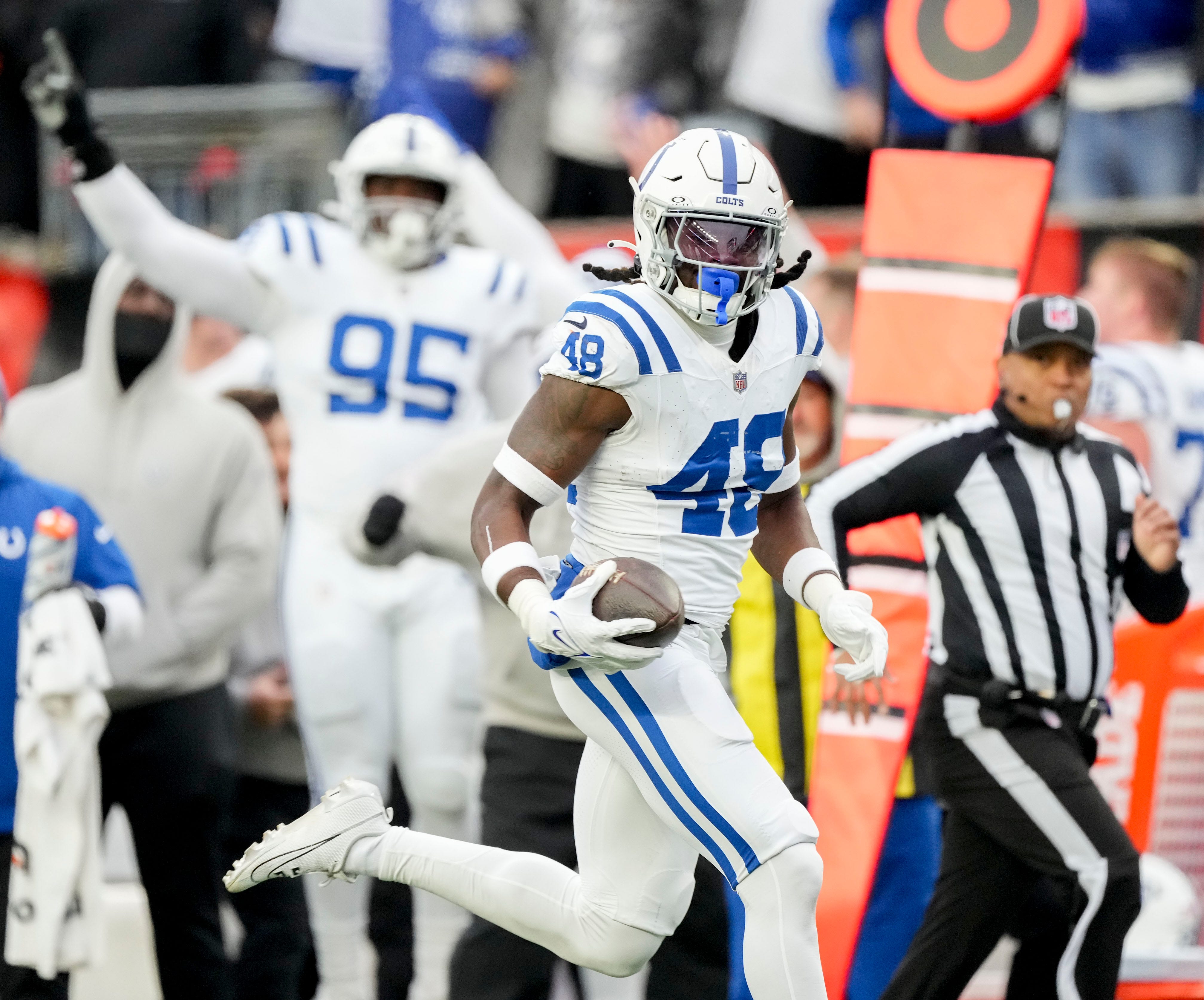 Indianapolis Colts safety Ronnie Harrison Jr. (48) rushes for a touchdown after intercepting a pass Sunday, Dec. 10, 2023, during a game against the Cincinnati Bengals at Paycor Stadium in Cincinnati.