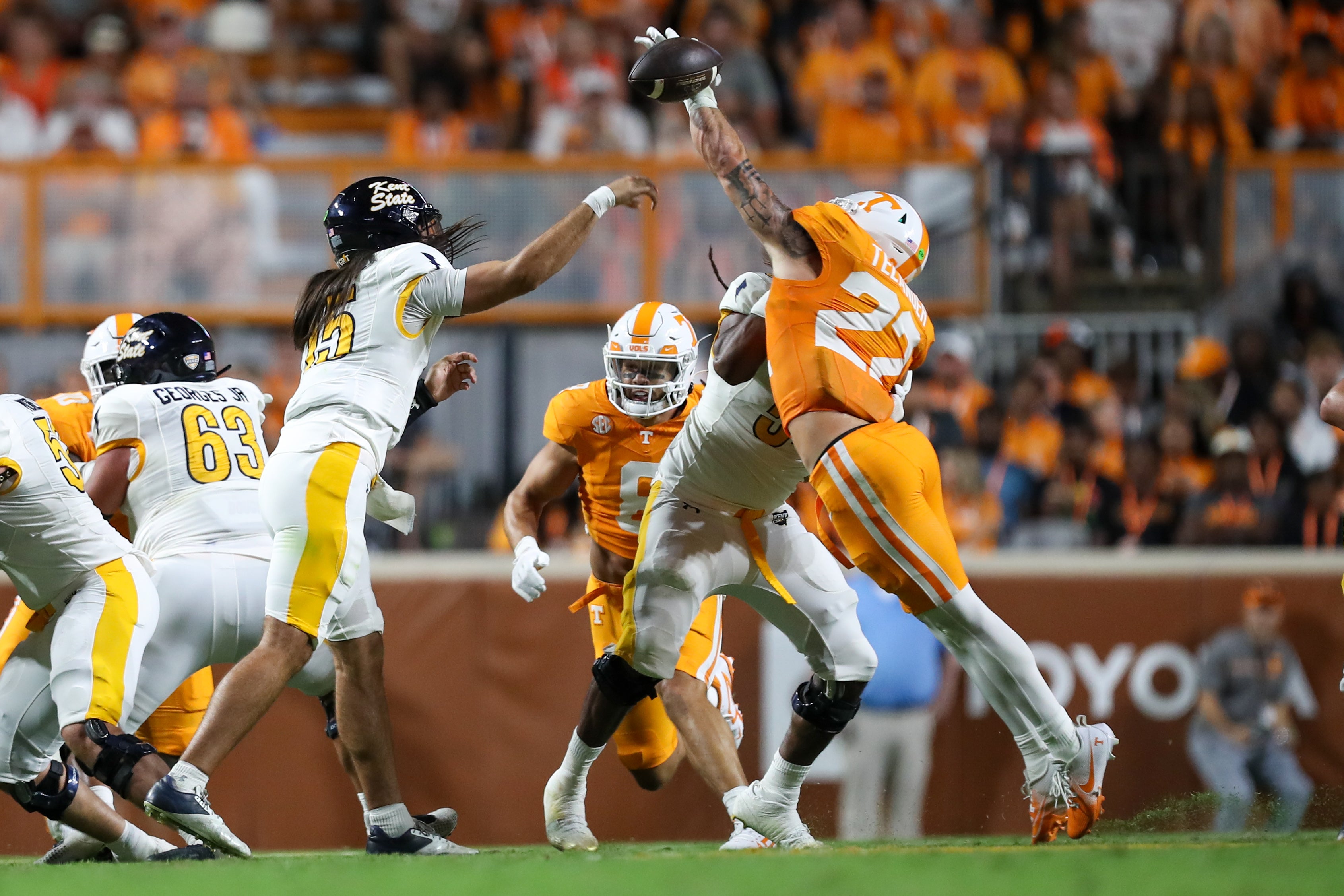 Sep 14, 2024; Knoxville, Tennessee, USA; Kent State Golden Flashes quarterback Devin Kargman (15) has a pass deflected by Tennessee Volunteers linebacker Jeremiah Telander (22) at Neyland Stadium.