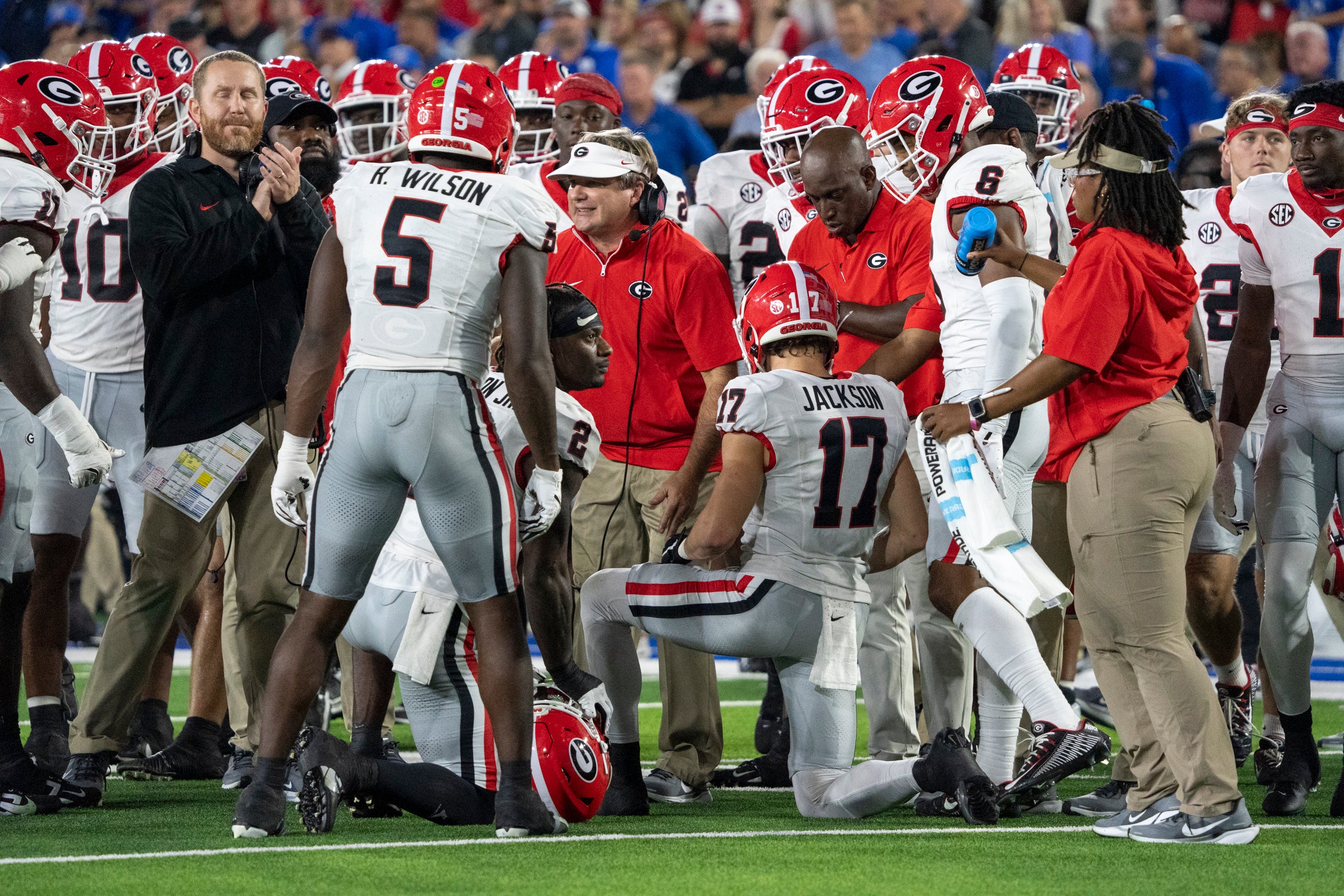 Georgia Bulldogs head coach Kirby Smart talks to players during a timeout in the second quarter against the Kentucky Wildcats at Kroger Field.