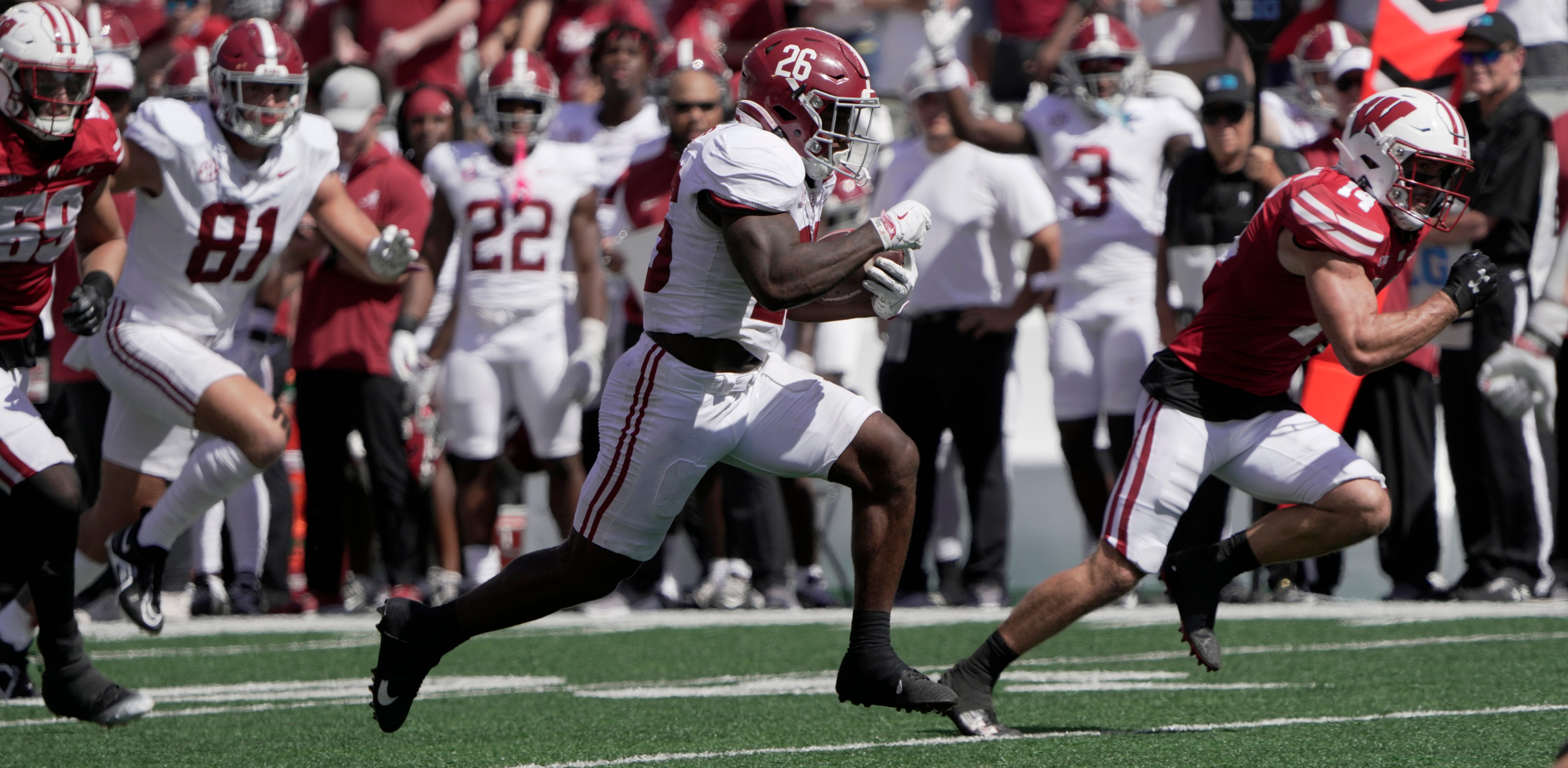 Alabama running back Jam Miller (26) scores a touchdown on a 34-yard run during the third quarter of their game Saturday, September 14, 2024 at Camp Randall Stadium in Madison, Wisconsin. Alabama beat Wisconsin 42-10.  