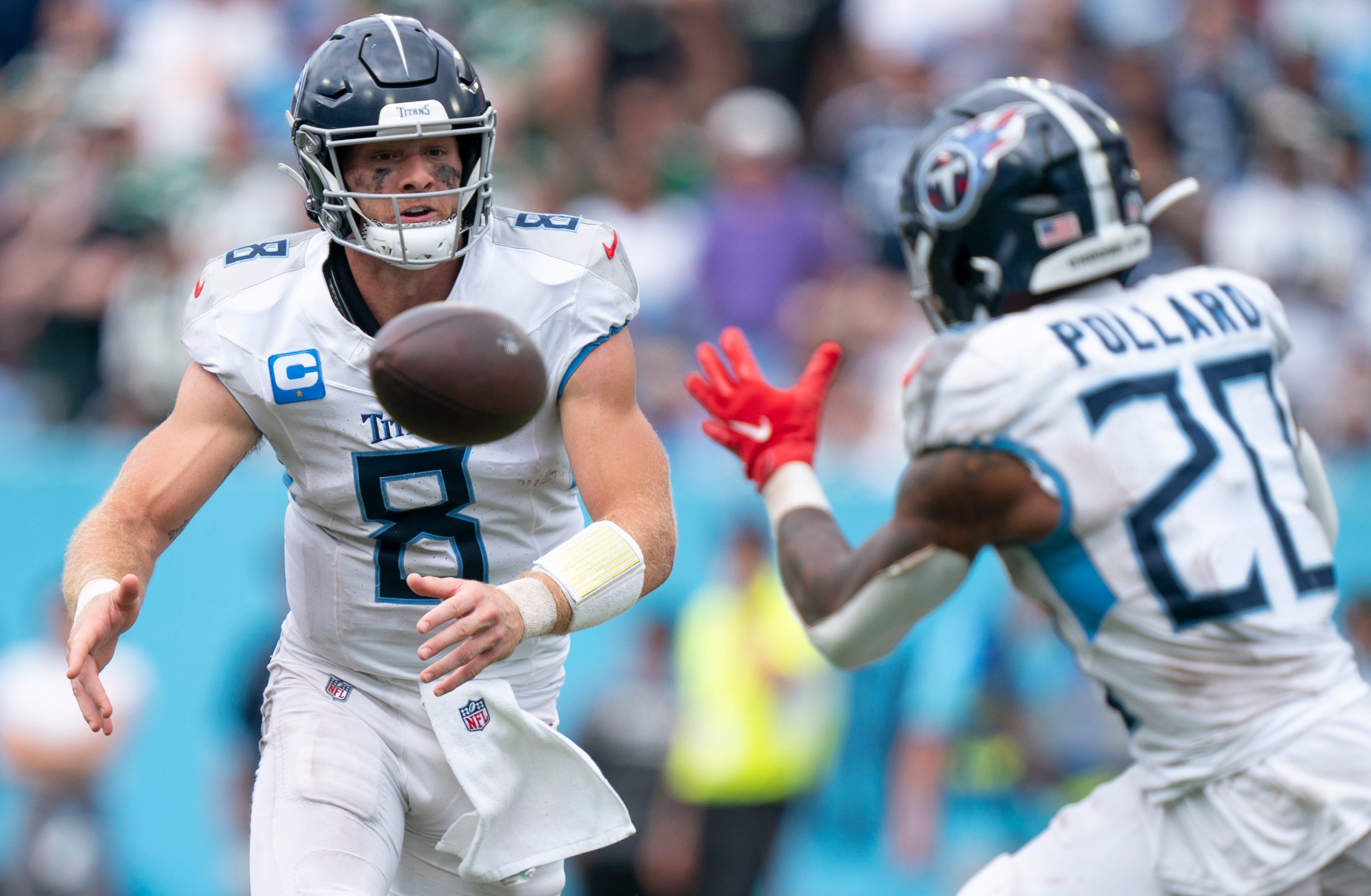 Tennessee Titans quarterback Will Levis (8) pitches to running back Tony Pollard (20) during their game at Nissan Stadium in Nashville, Tenn., Sunday, Sept. 15, 2024.