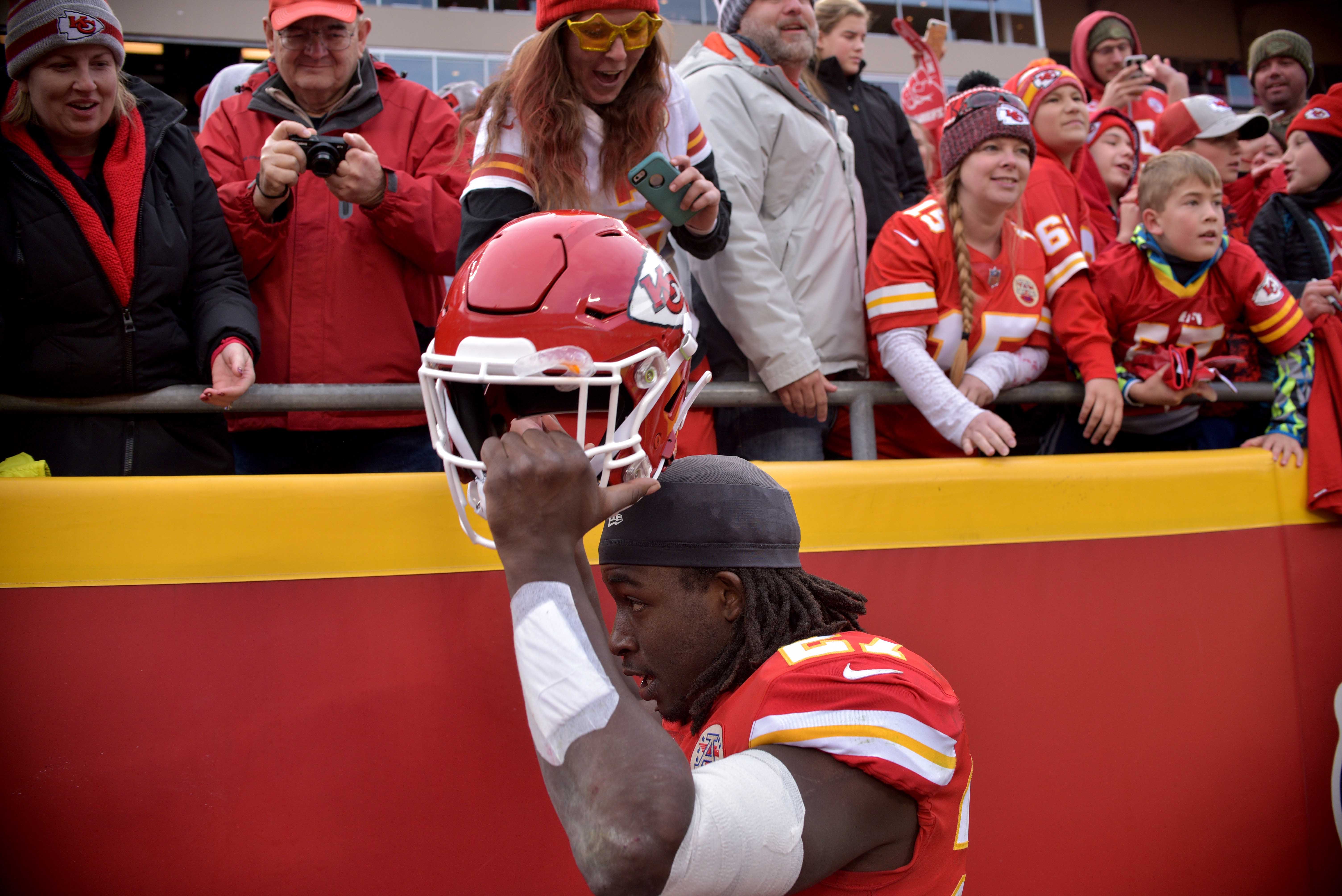 Nov 11, 2018; Kansas City, MO, USA; Kansas City Chiefs running back Kareem Hunt (27) waves to fans while leaving the field after the win over the Arizona Cardinals at Arrowhead Stadium. The Chiefs won 26-14.