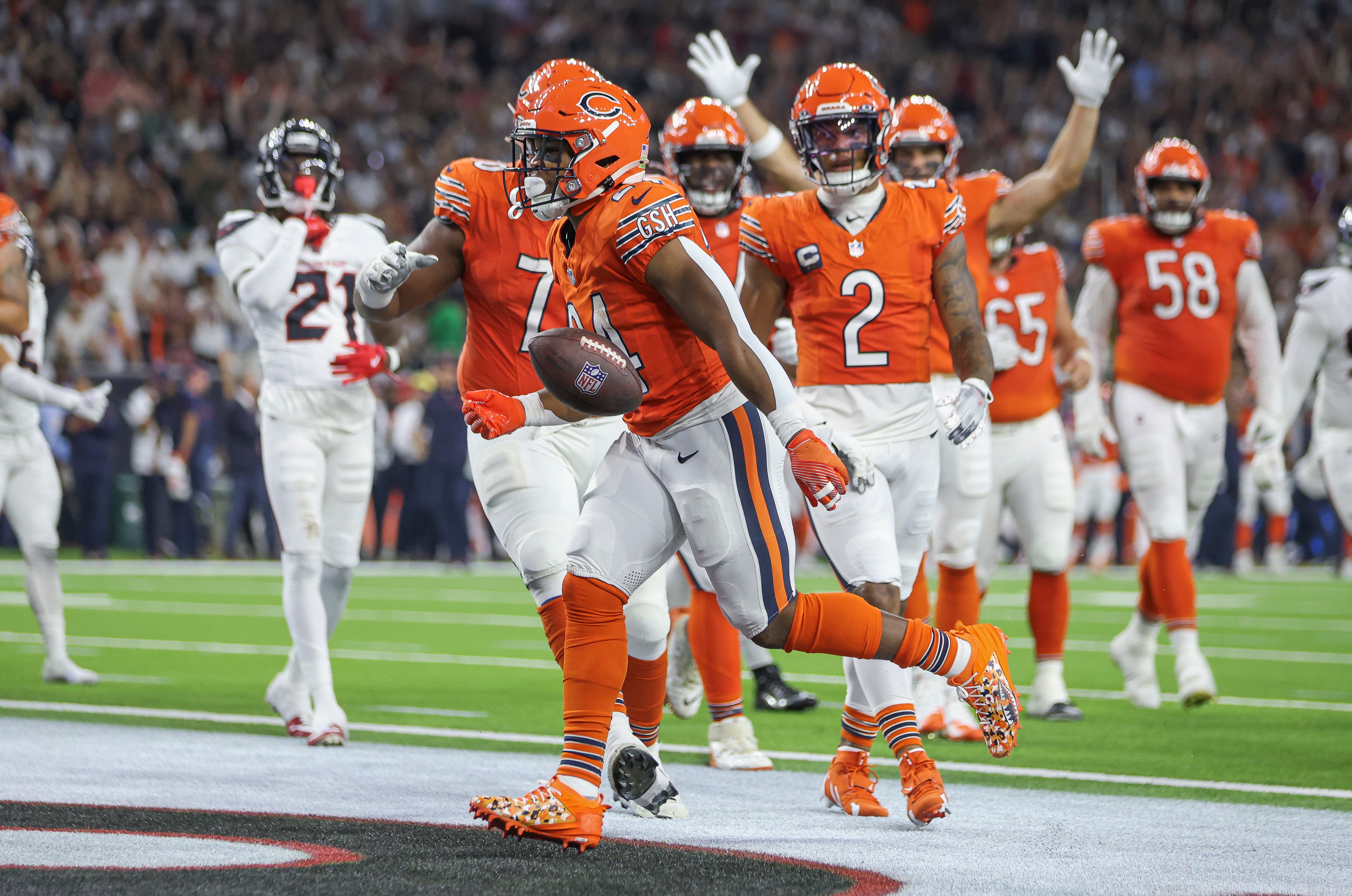 Sep 15, 2024; Houston, Texas, USA; Chicago Bears running back Khalil Herbert (24) reacts after scoring a touchdown during the second quarter against the Houston Texans at NRG Stadium.